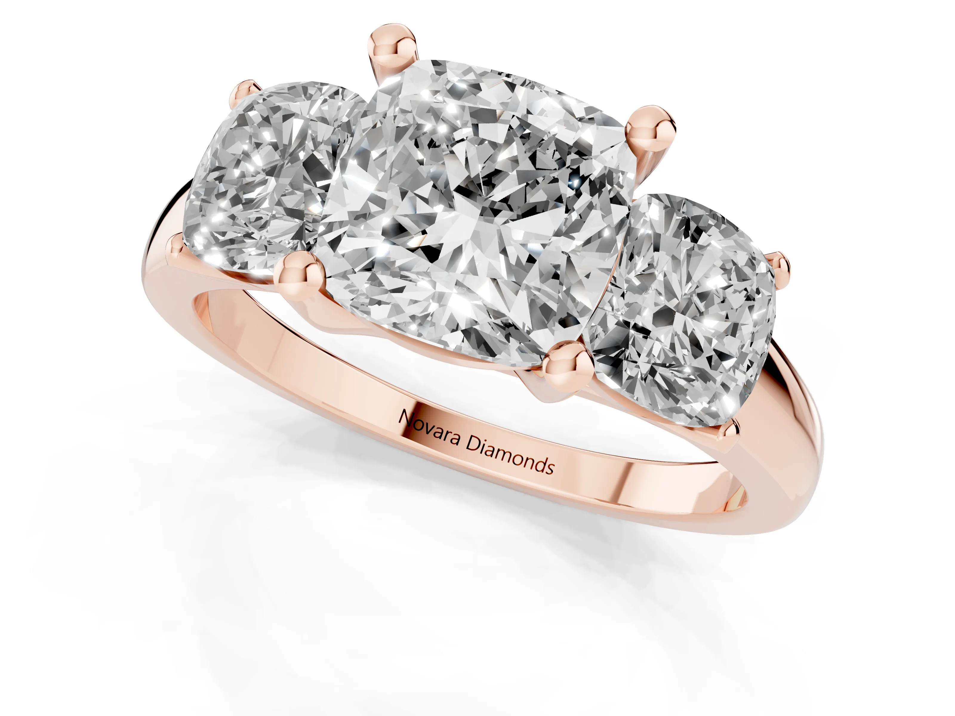 Cushion Cut Diamond Three-Stone Ring Set in Rose gold with Classic Prong Setting and Plain Band