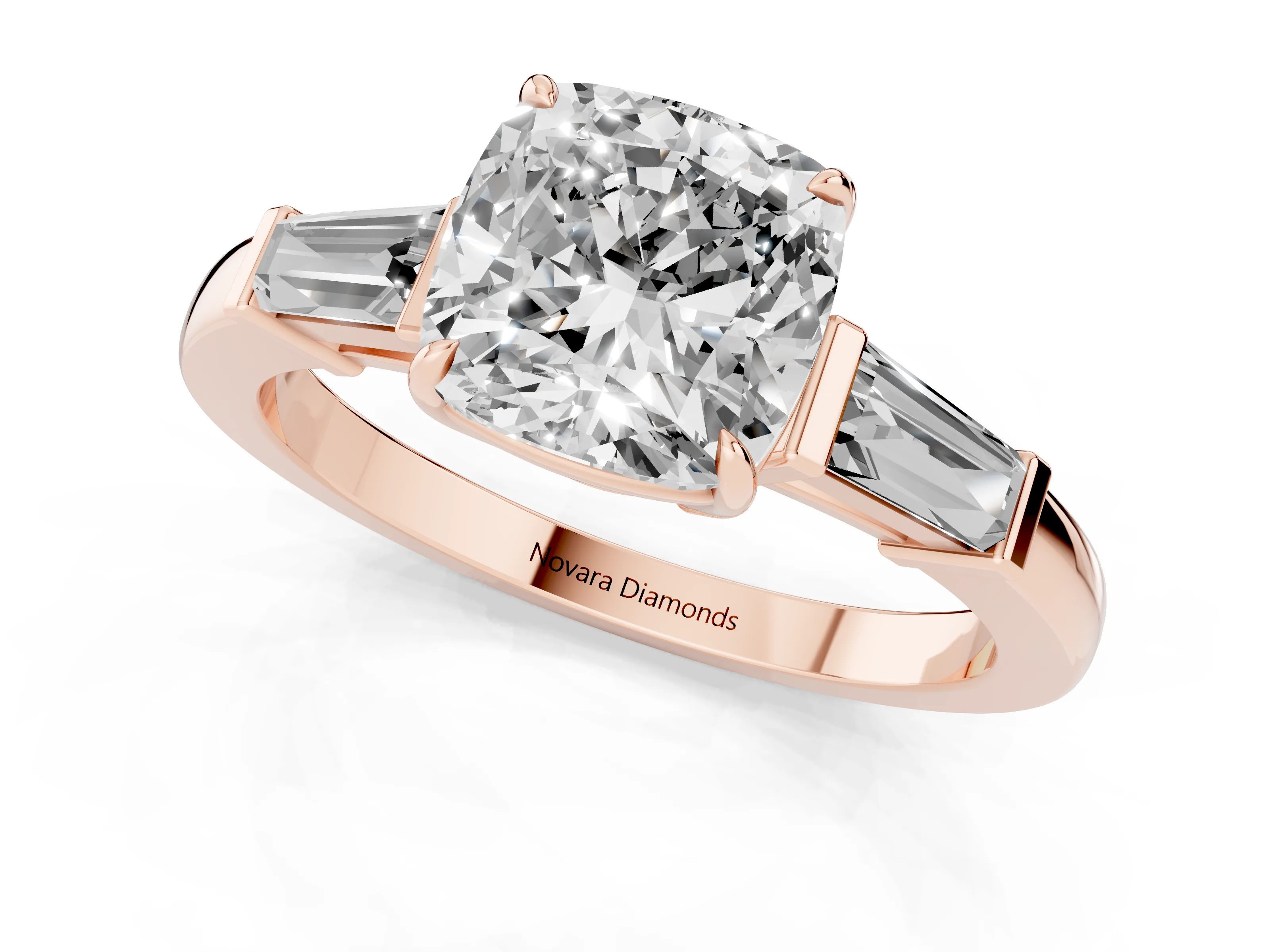 Cushion Cut Diamond Three-Stone Ring Set in Rose gold with Tapered Baguette Side Stones and Prong Setting