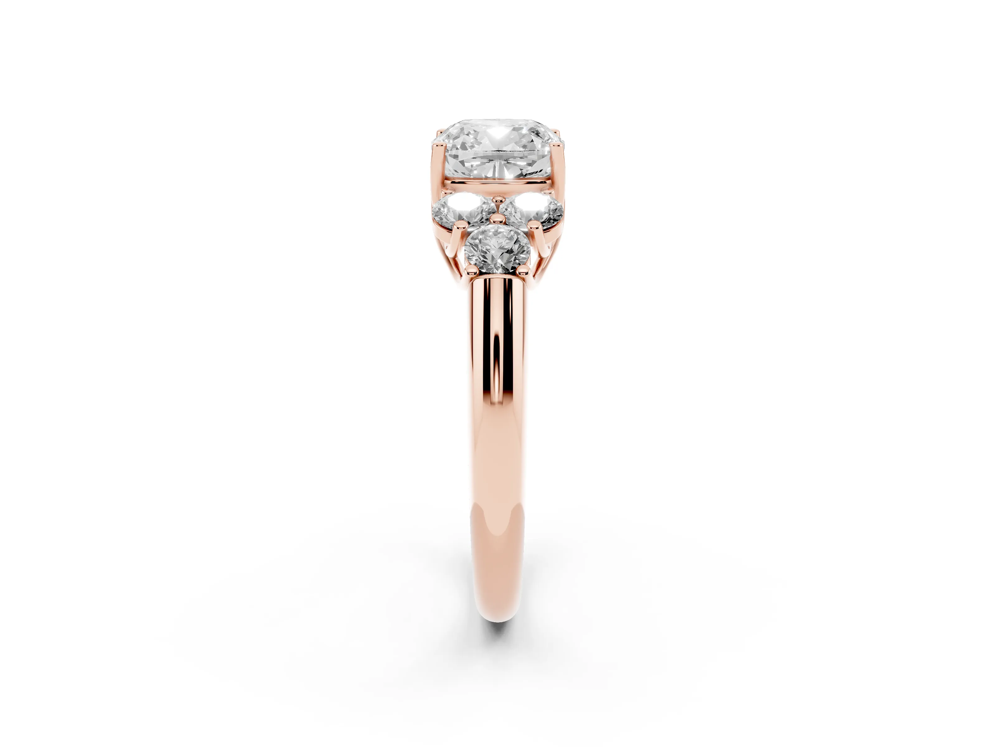 Cushion Cut Diamond Cluster Ring Set in Rose gold with Round Accent Stones and Prong Setting on a Plain Band