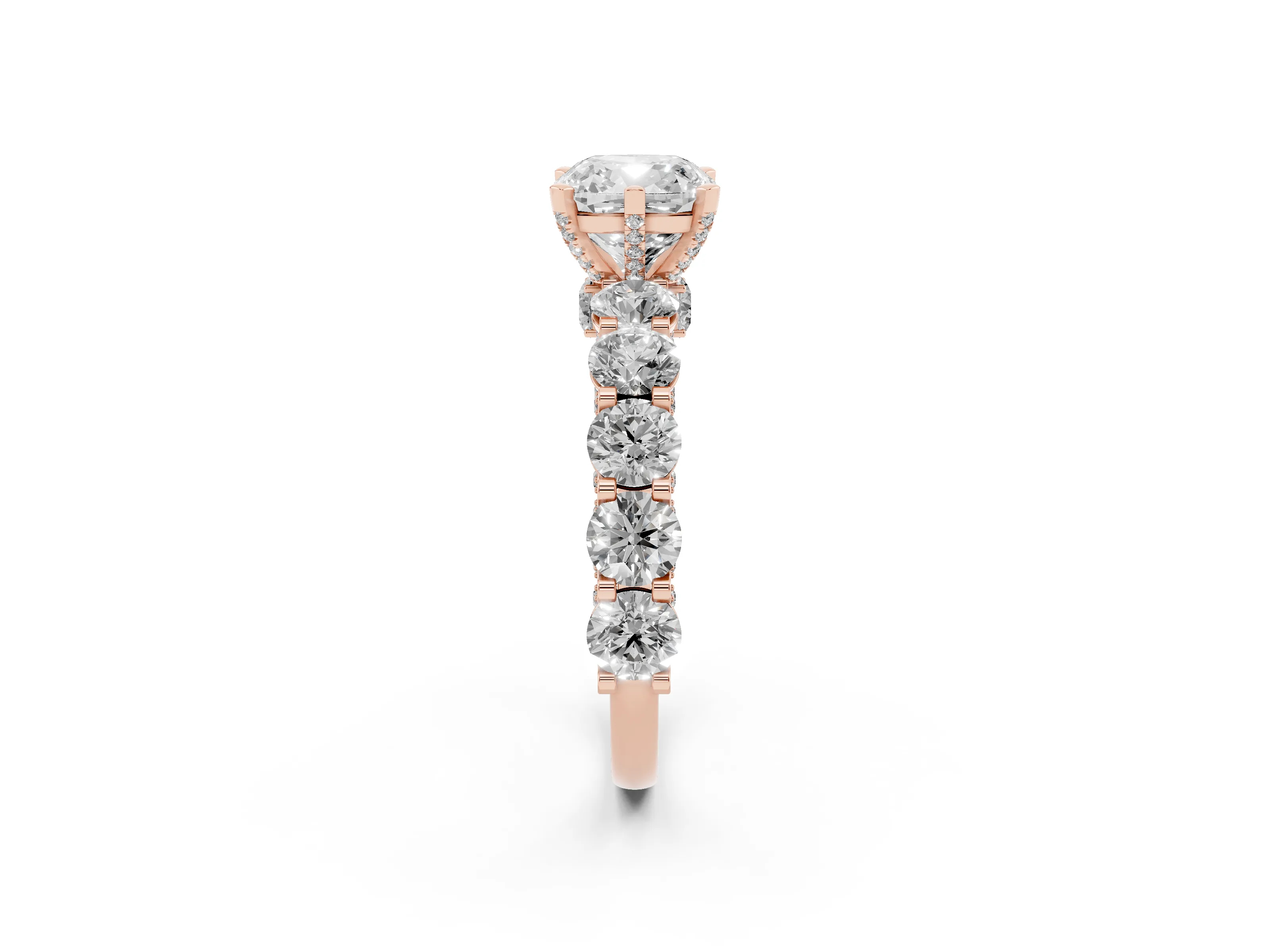 Cushion Cut Diamond Side Stone Ring Set in Rose gold with Alternating Round and Oval Side Stones