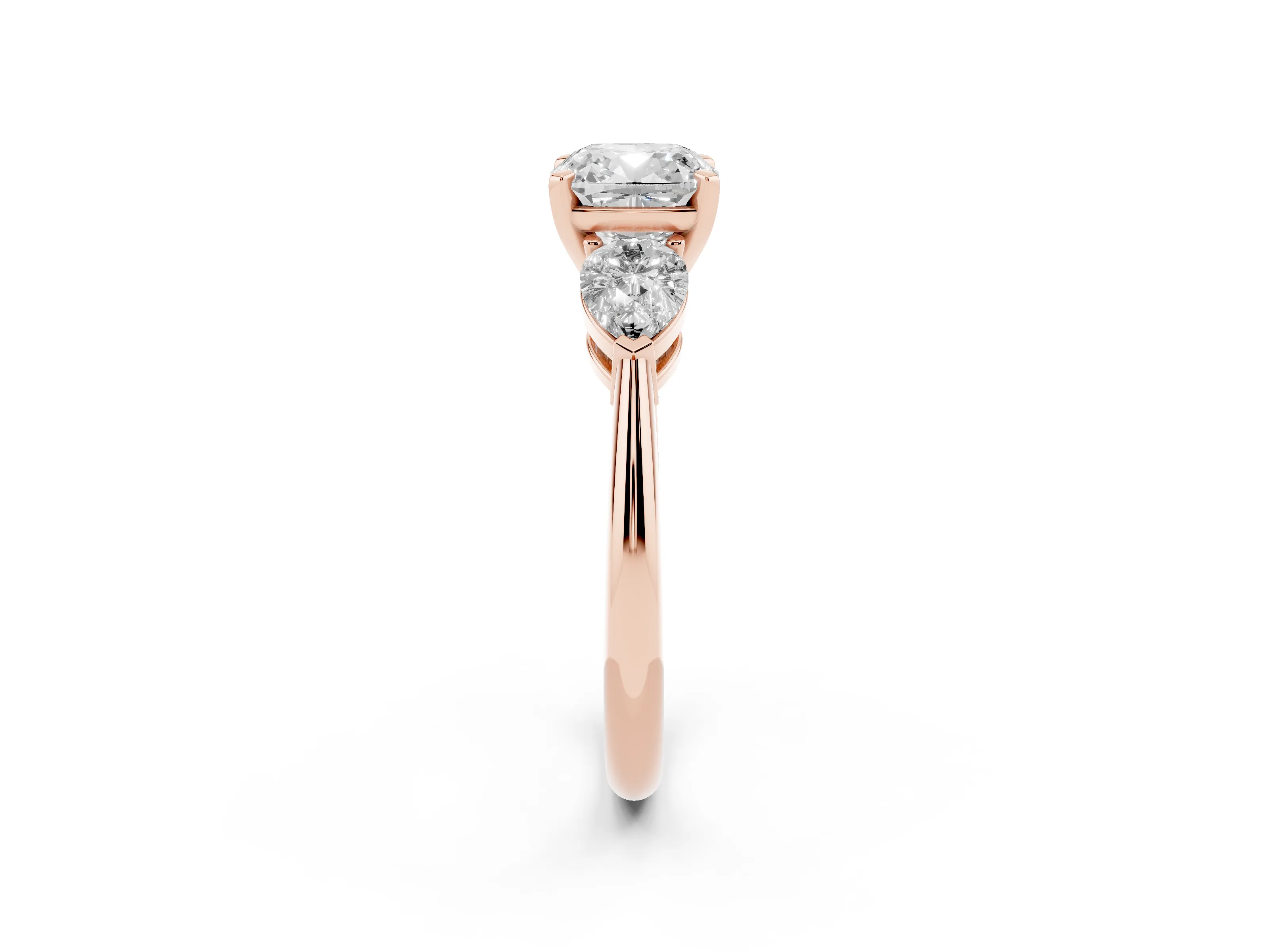 Three-Stone Cushion Cut Diamond Ring Set in Rose gold with Pear Side Stones and Prong Setting