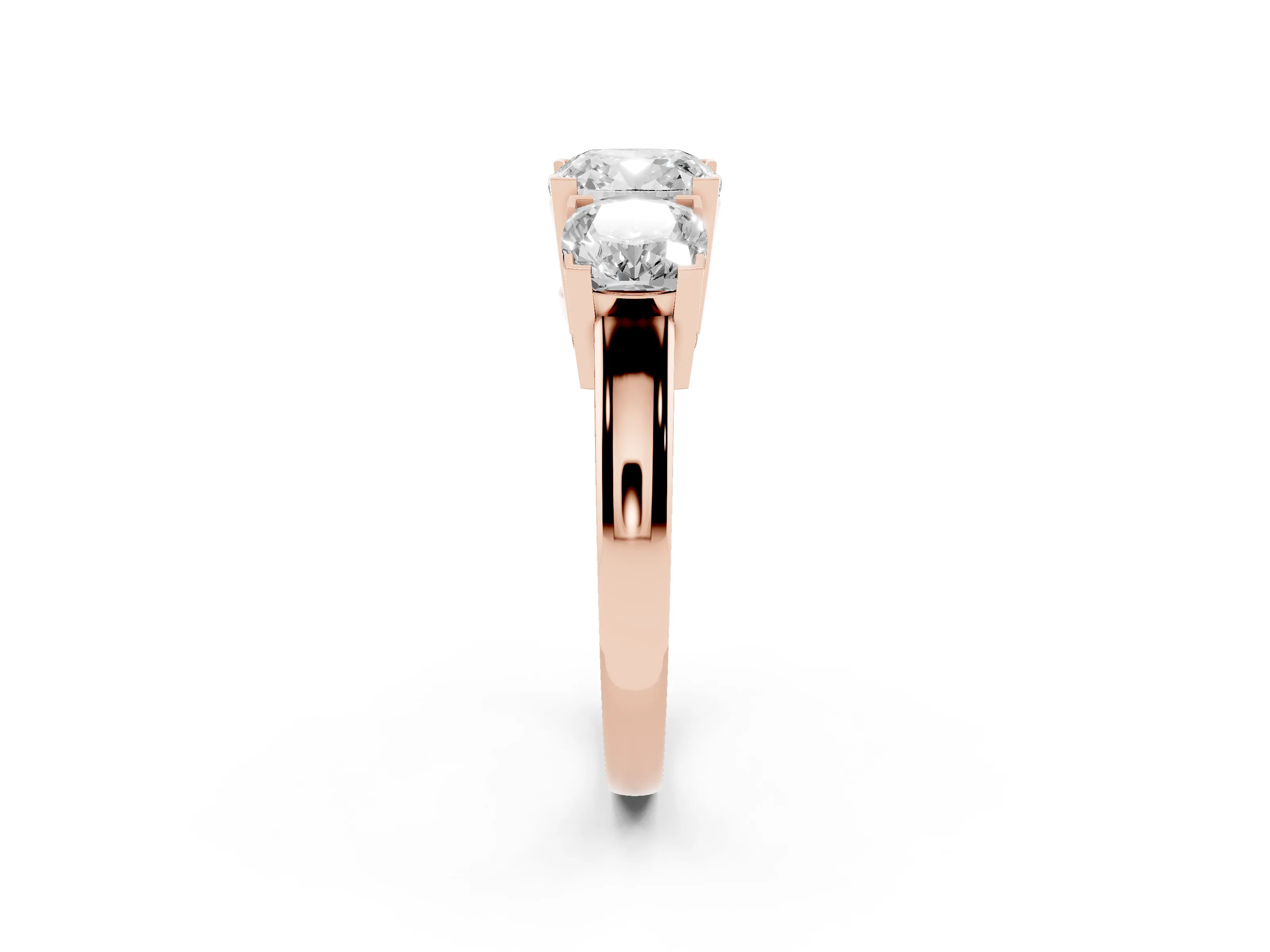 Cushion Cut Diamond Three-Stone Ring Set in Rose gold with Channel-Set Band and Prong Settings
