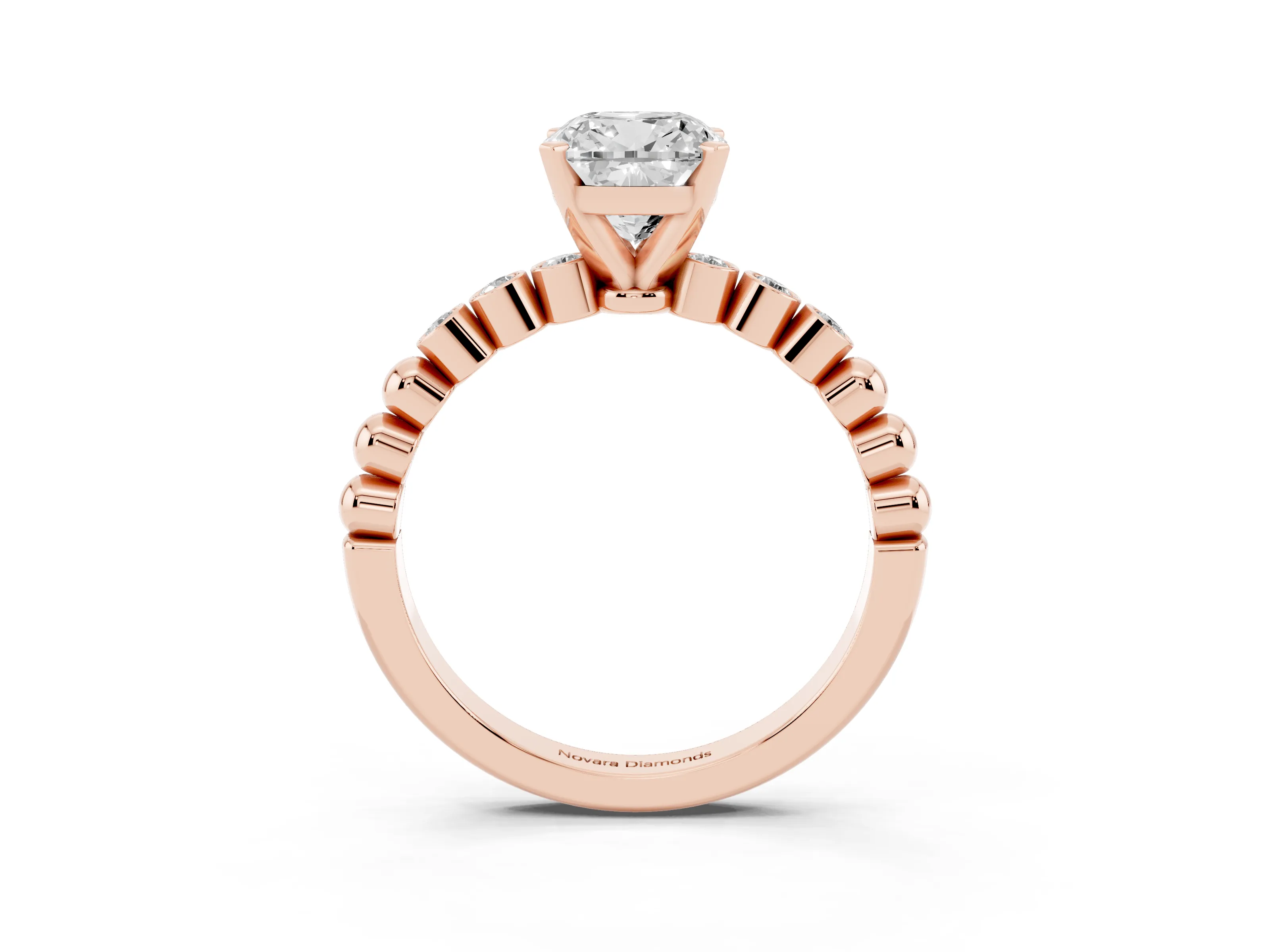 Cushion Cut Diamond Solitaire Engagement Ring Set in Rose gold with Bezel Accents on Beaded Band