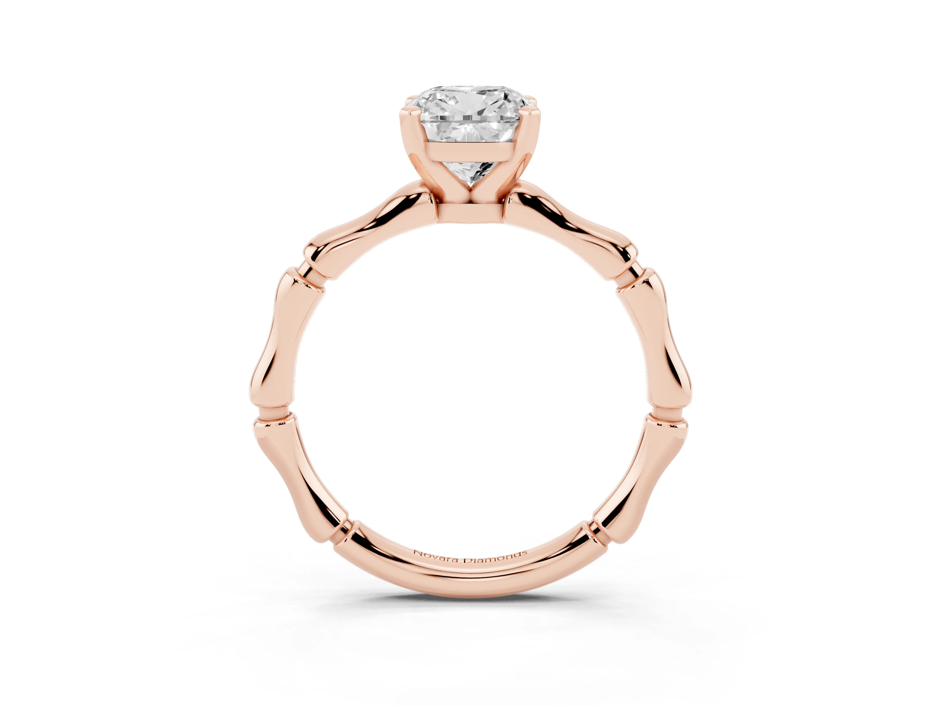 Cushion Cut Diamond Solitaire Ring Set in Rose gold with Bamboo Band and Prong Setting