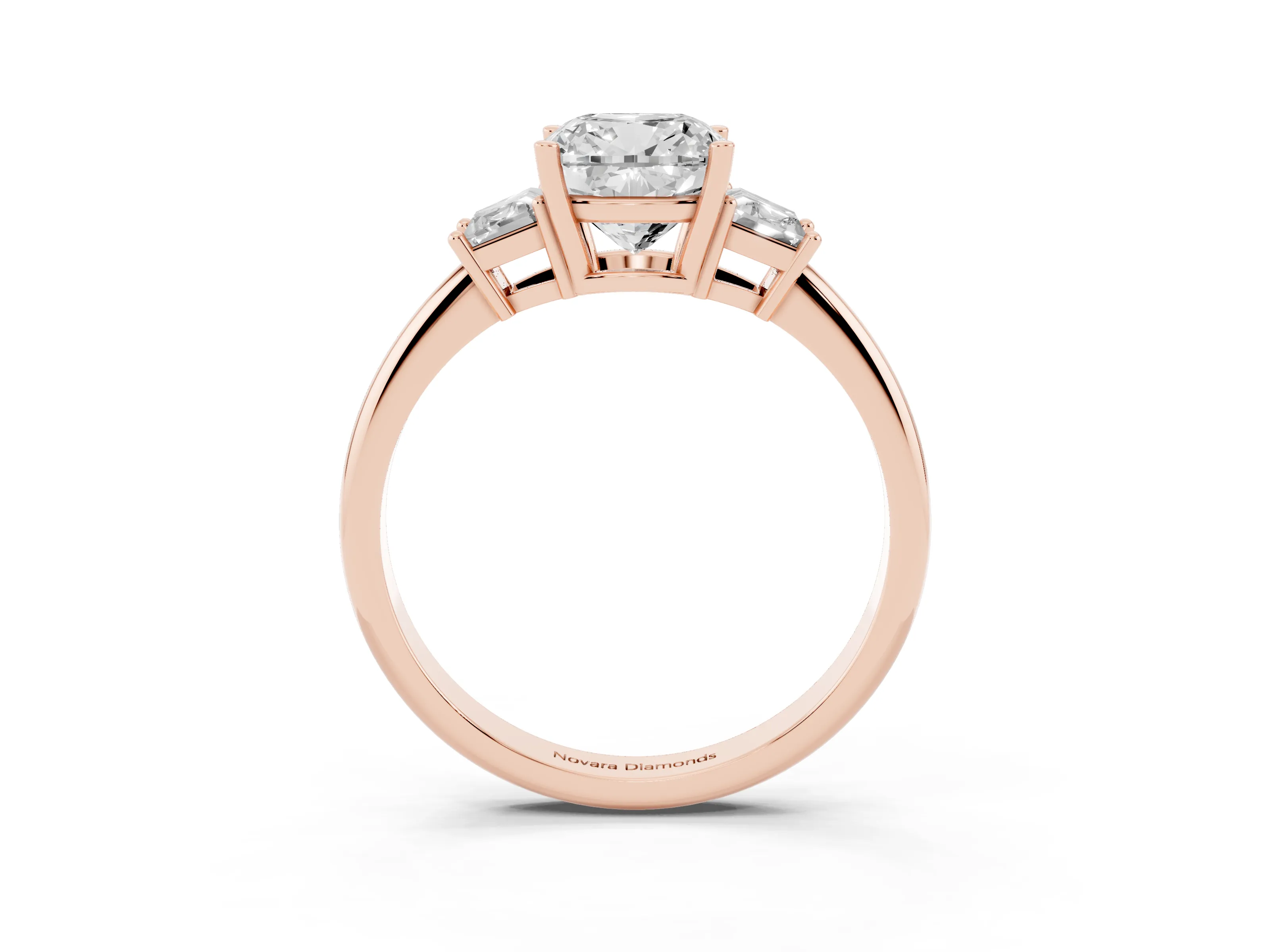 Cushion Cut Diamond Three-Stone Ring Set in Rose gold with Trapezoid Side Stones and Prong Setting