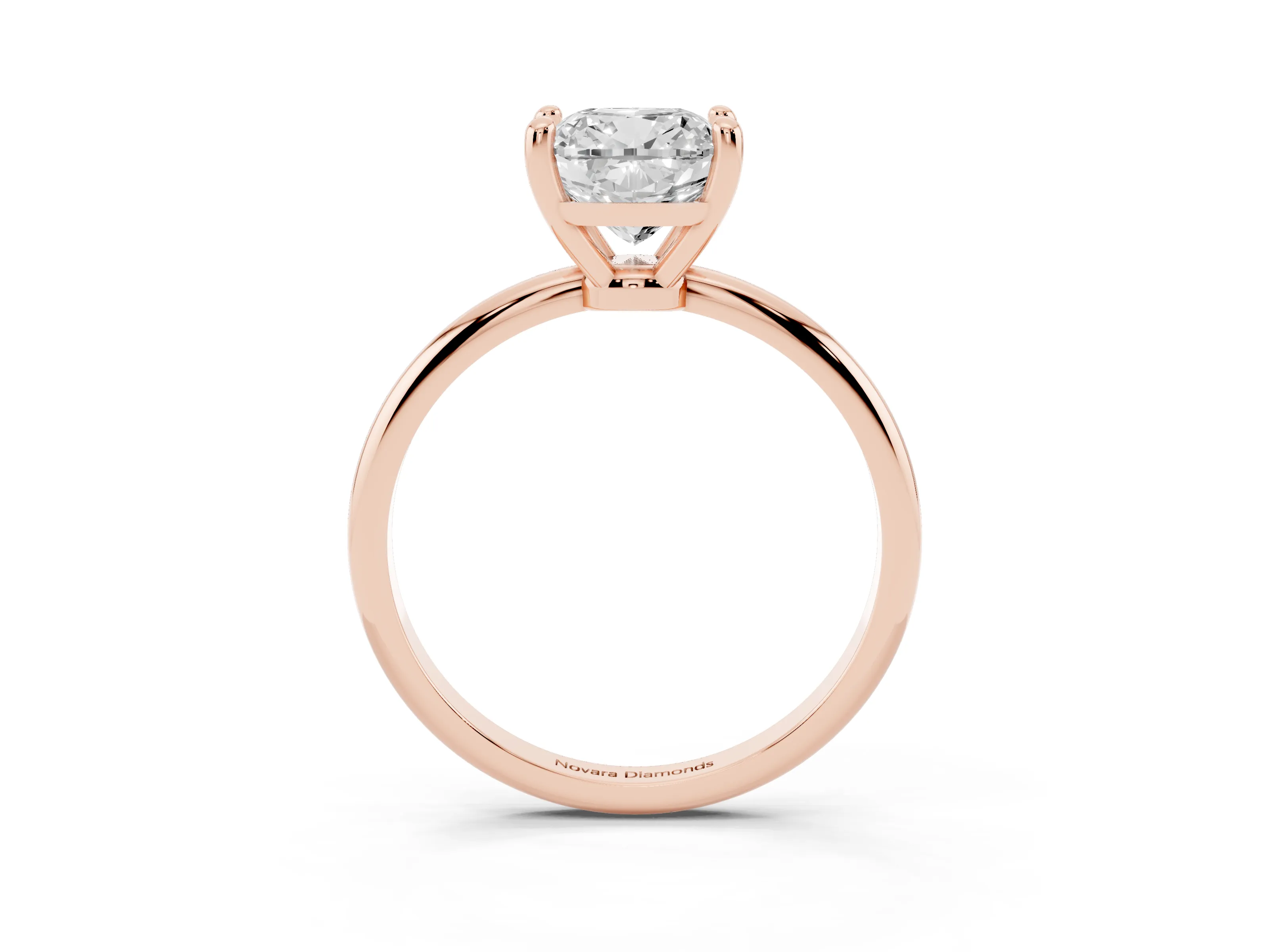 Cushion Cut Diamond Solitaire Ring Set in Rose gold with Secure Prong Setting on a Classic Band