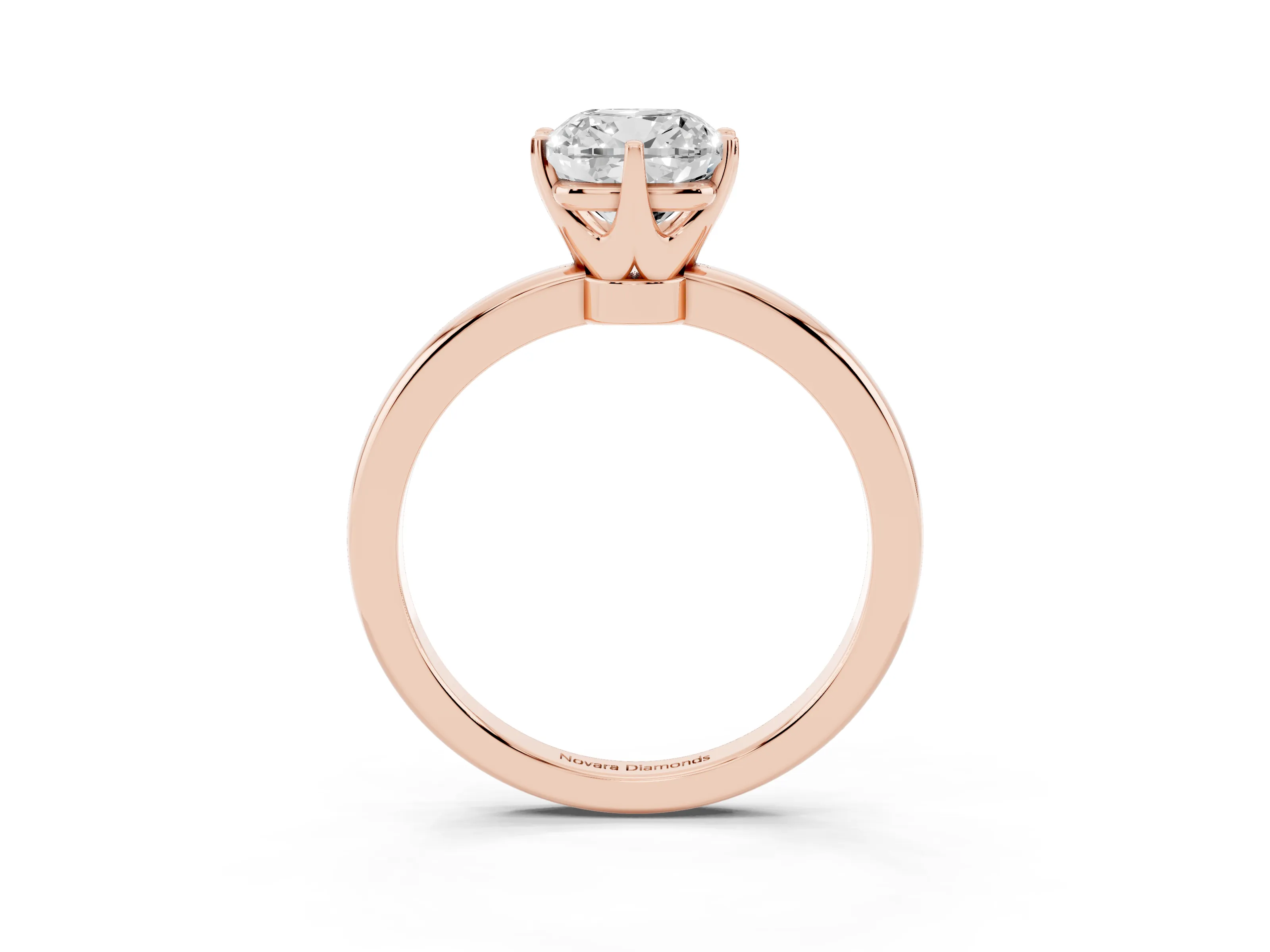 Cushion Cut Diamond Solitaire Ring Set in Rose gold with Raised Prong Setting on a Classic Band