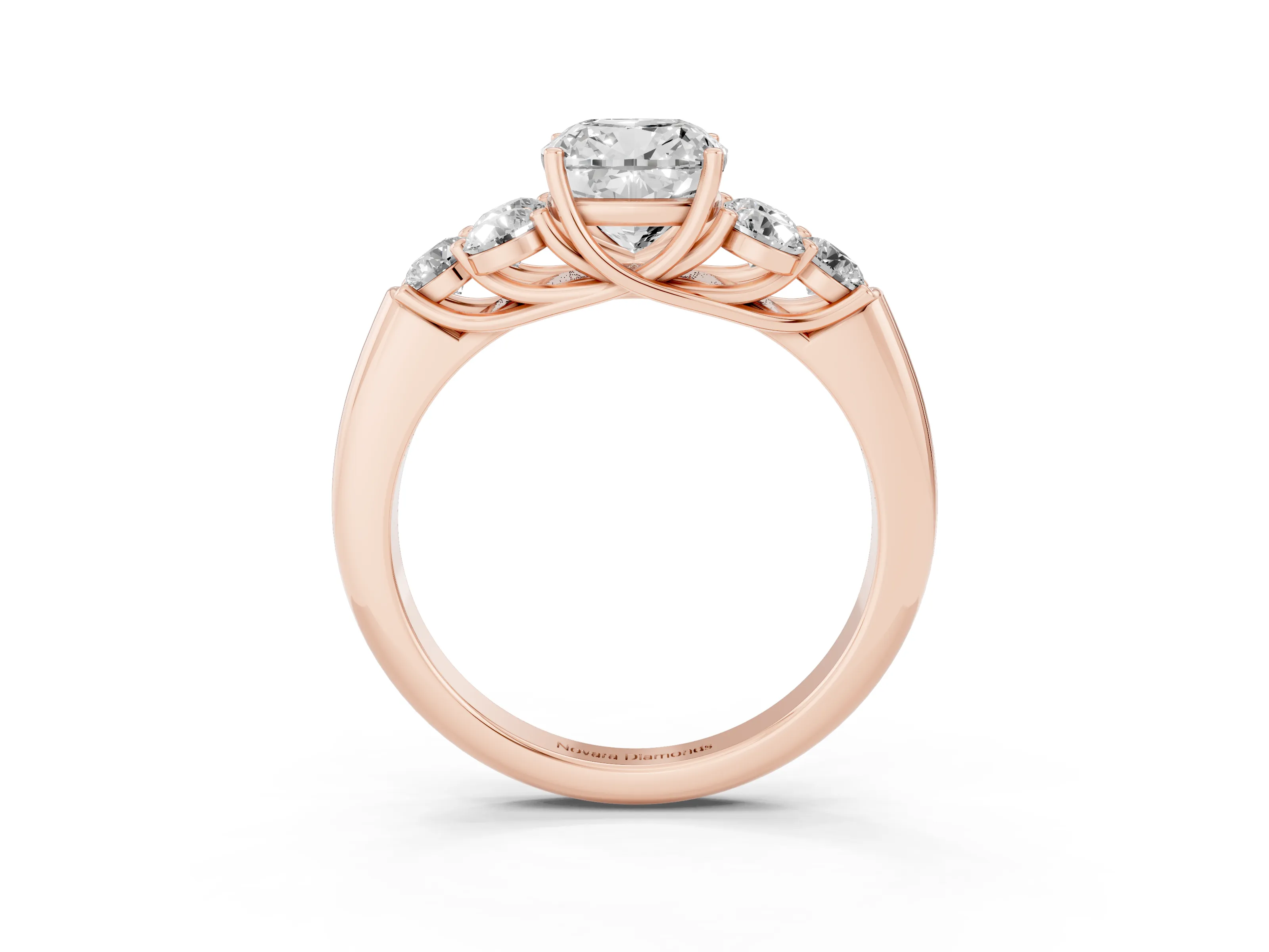 Cushion Cut Diamond Cluster Ring Set in Rose gold with Round Accent Stones and Prong Setting on a Plain Band