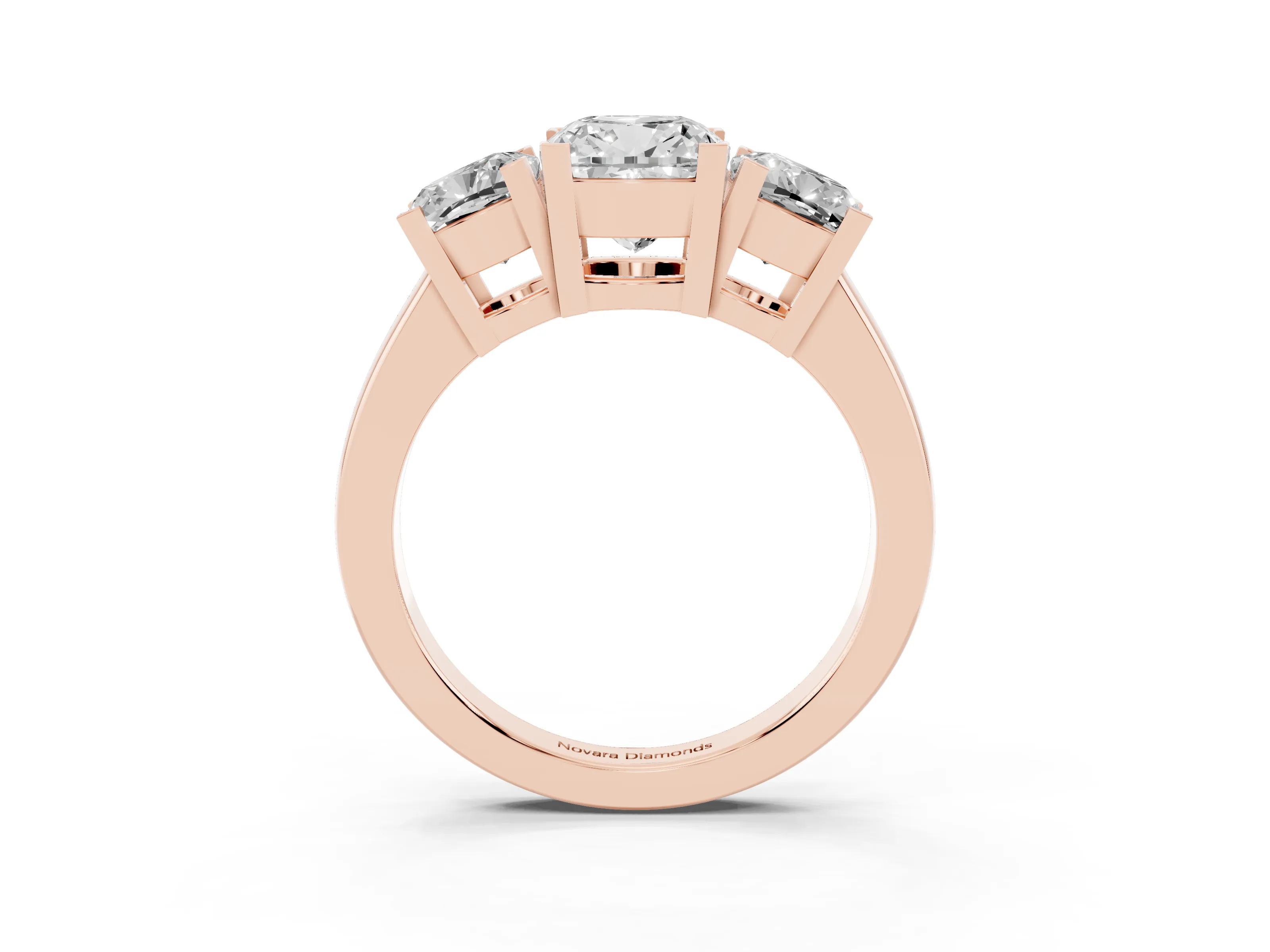 Cushion Cut Diamond Three-Stone Ring Set in Rose gold with Channel-Set Band and Prong Settings
