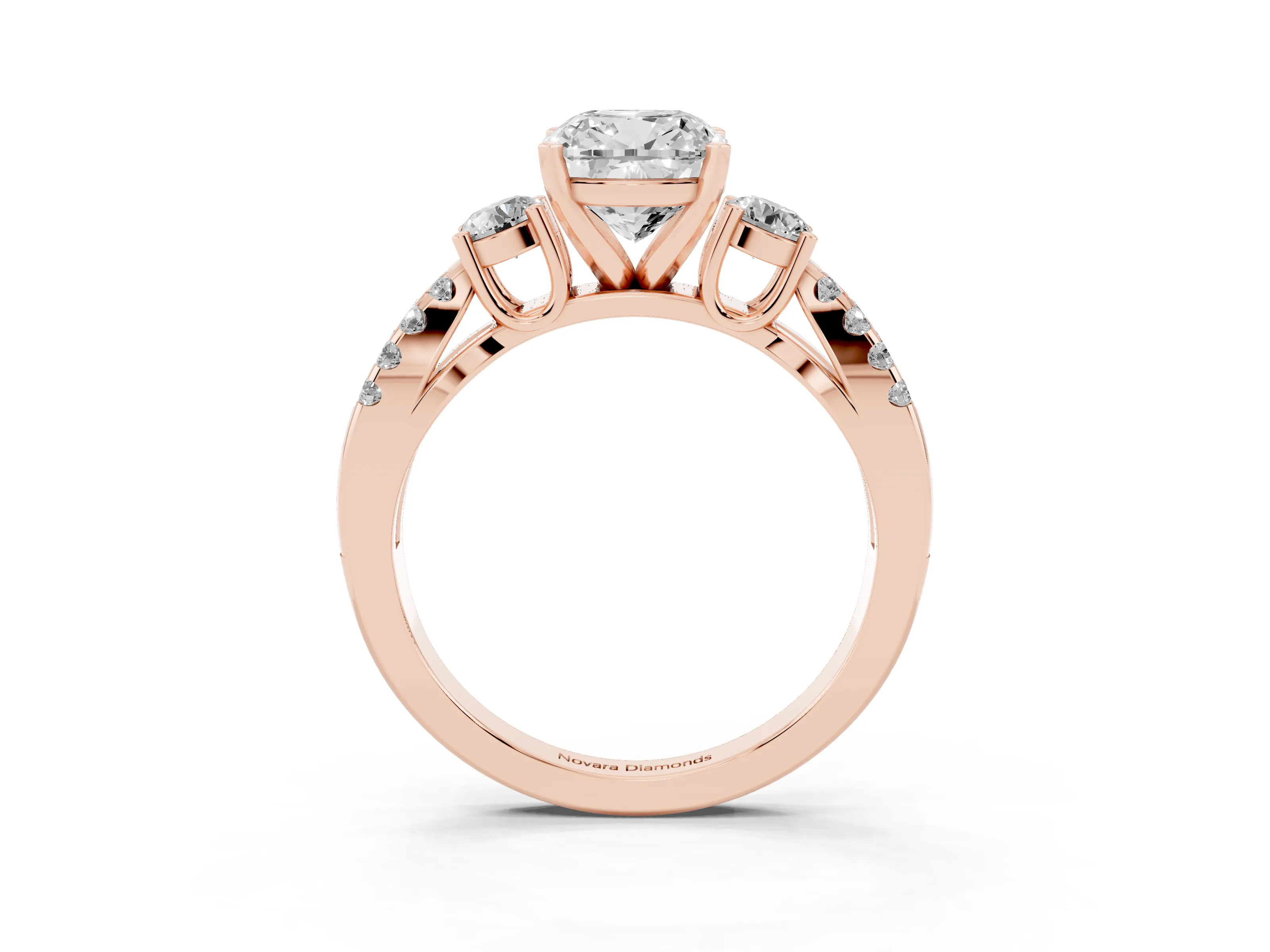 Cushion Cut Diamond Three-Stone Ring Set in Rose gold with Pavé Split Shank and Prong Setting