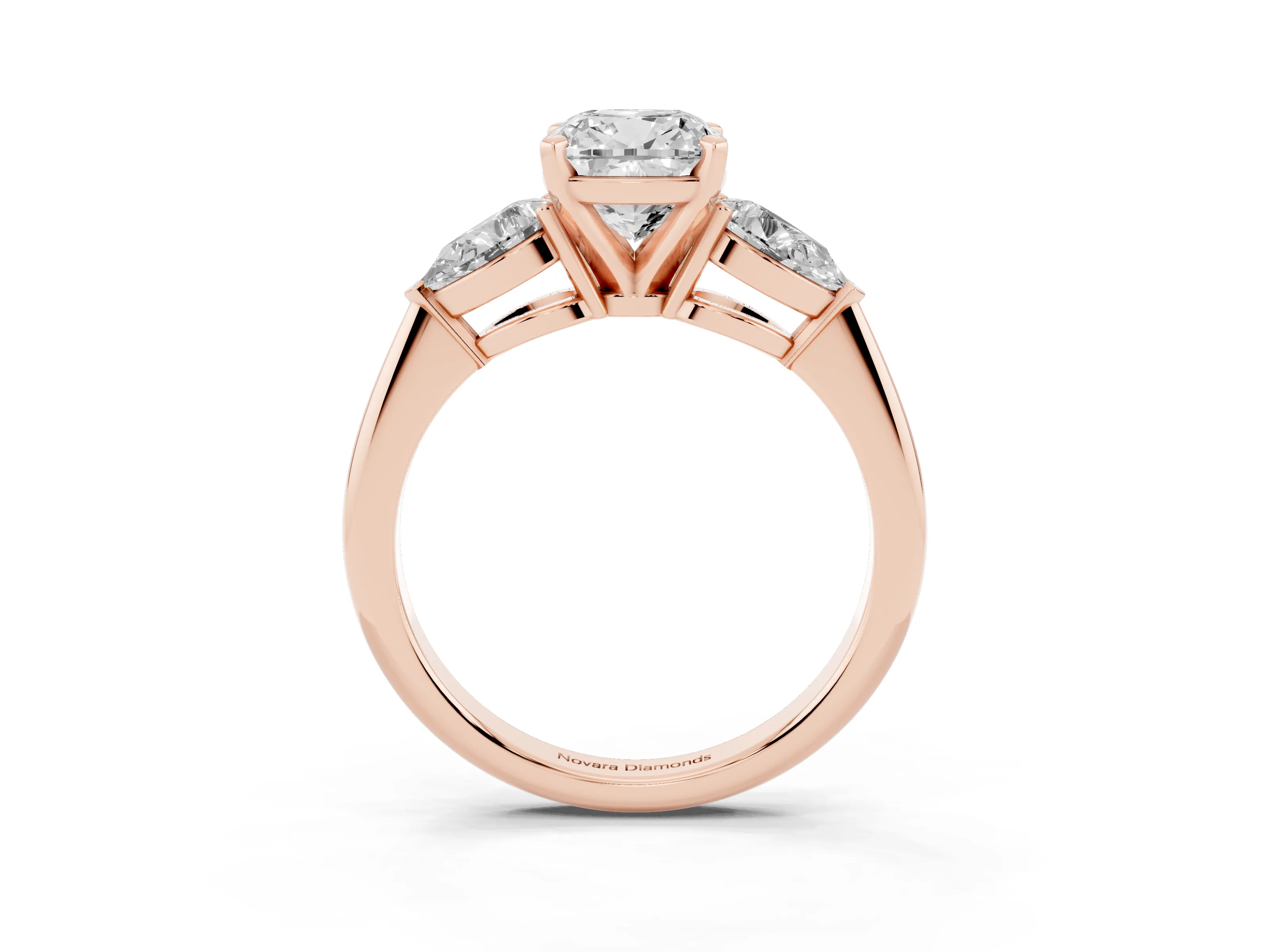 Three-Stone Cushion Cut Diamond Ring Set in Rose gold with Pear Side Stones and Prong Setting