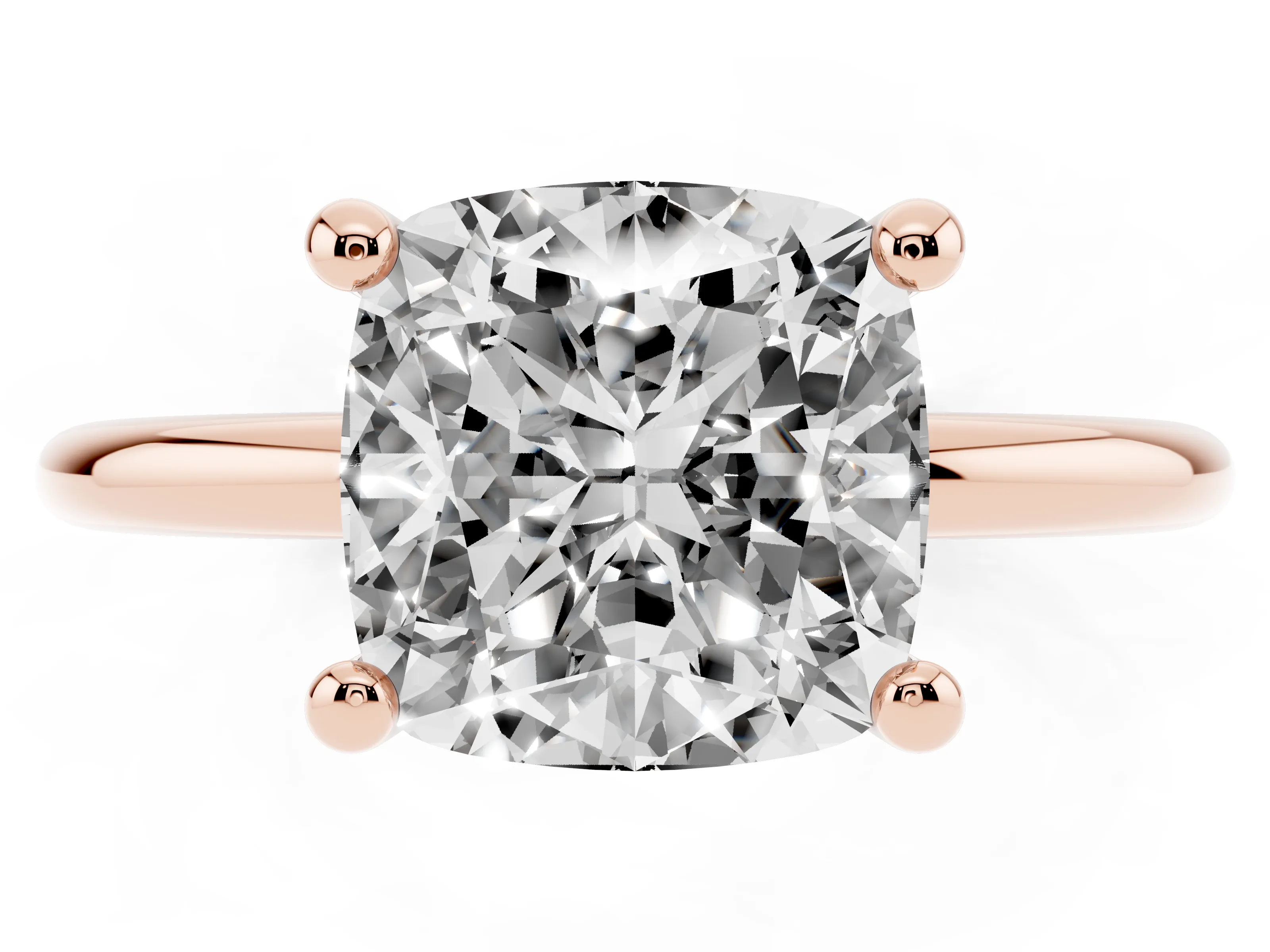 Cushion Cut Diamond Solitaire Ring Set in Rose gold with Secure Prong Setting on a Classic Band