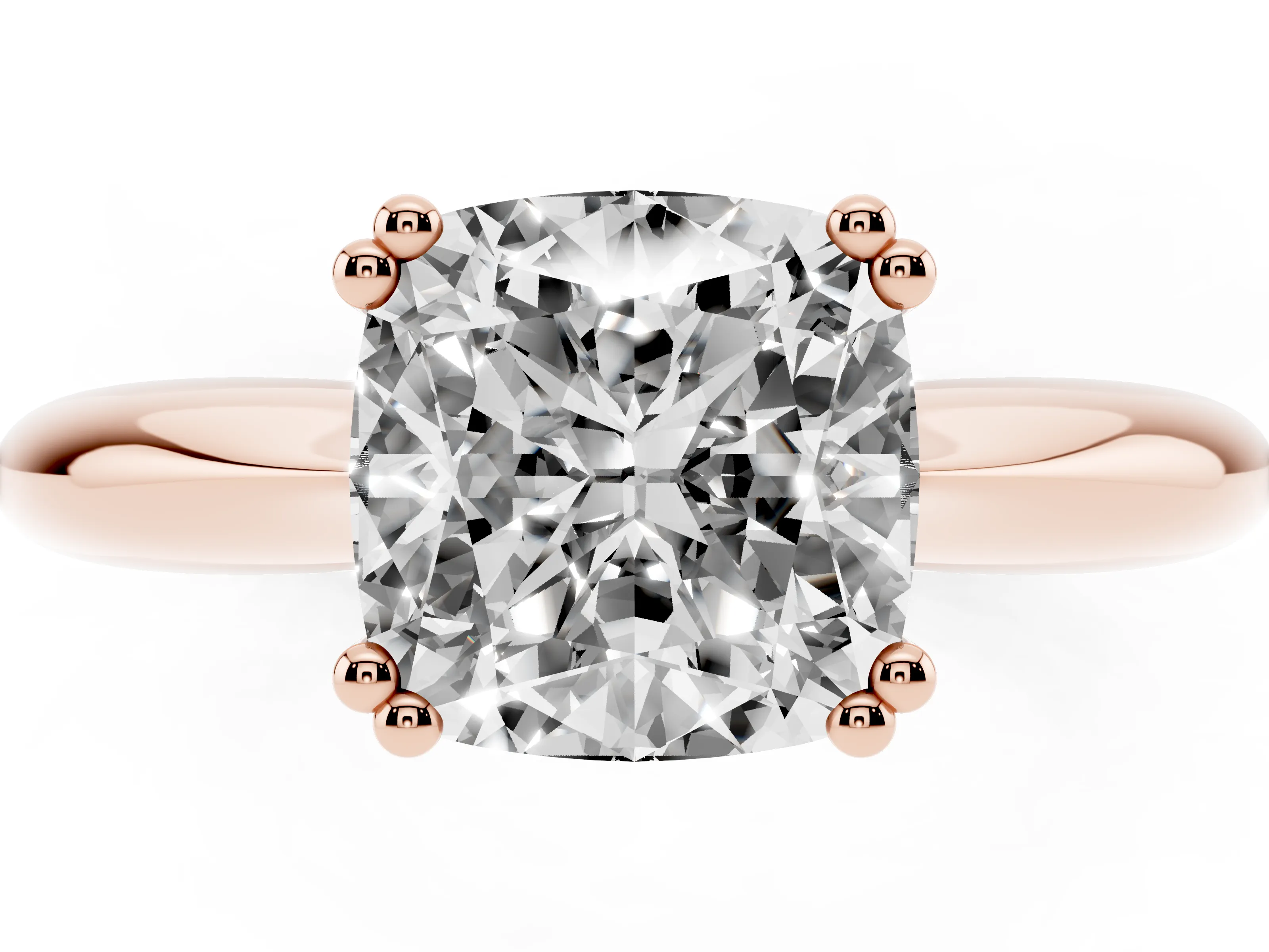 Cushion Cut Diamond Solitaire Engagement Ring Set in Rose gold with Tapered Band and Prong Setting