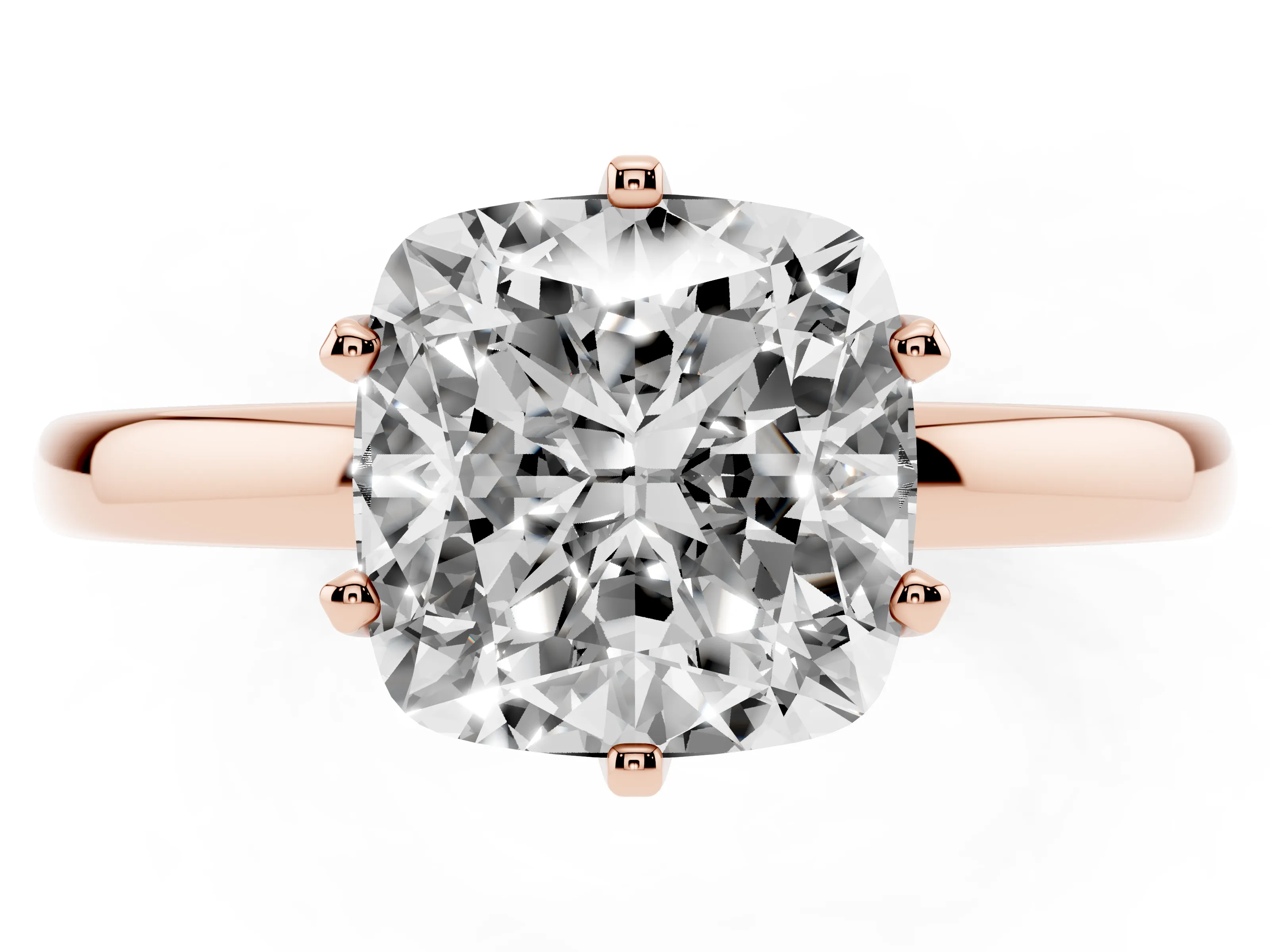 Cushion Cut Diamond Solitaire Ring Set in Rose gold with Raised Prong Setting on a Classic Band