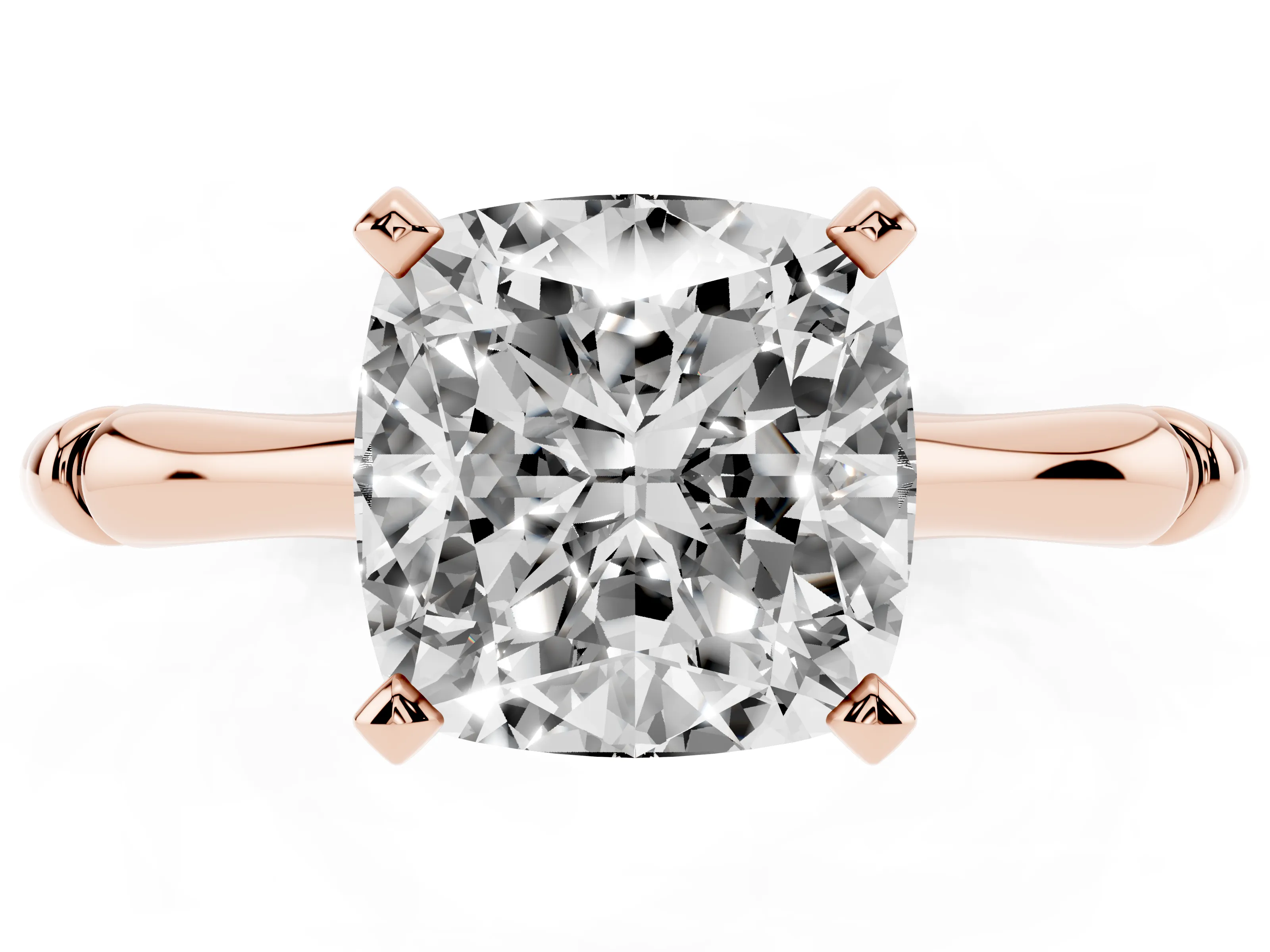 Cushion Cut Diamond Solitaire Ring Set in Rose gold with Bamboo Band and Prong Setting