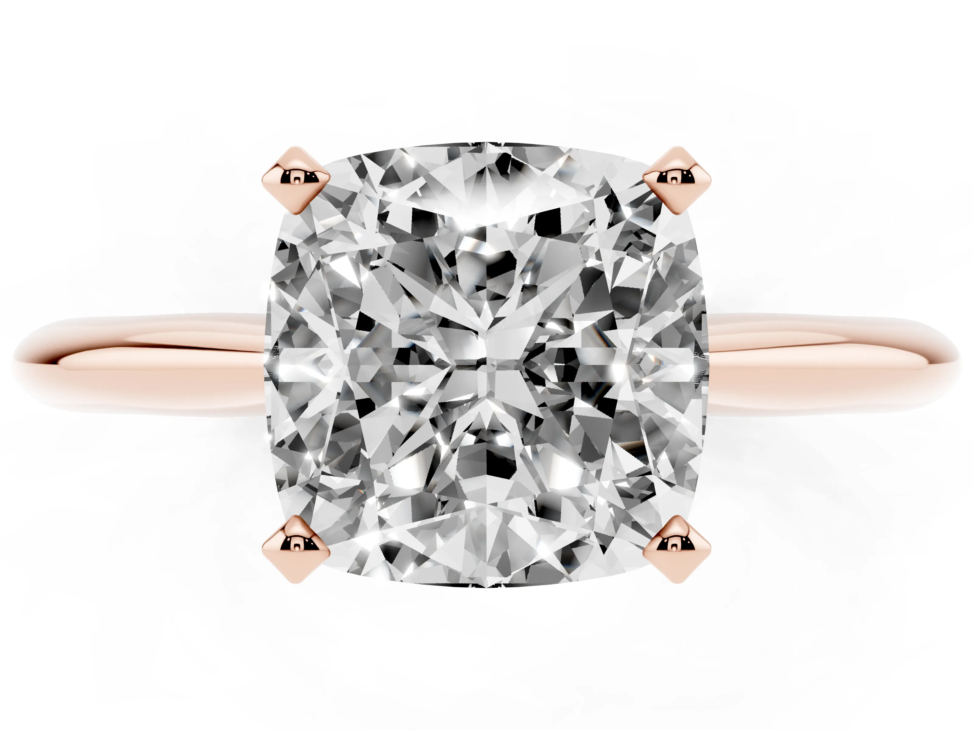Cushion Cut Diamond Solitaire Ring Set in Rose gold with Prong Setting on a Plain Round Band
