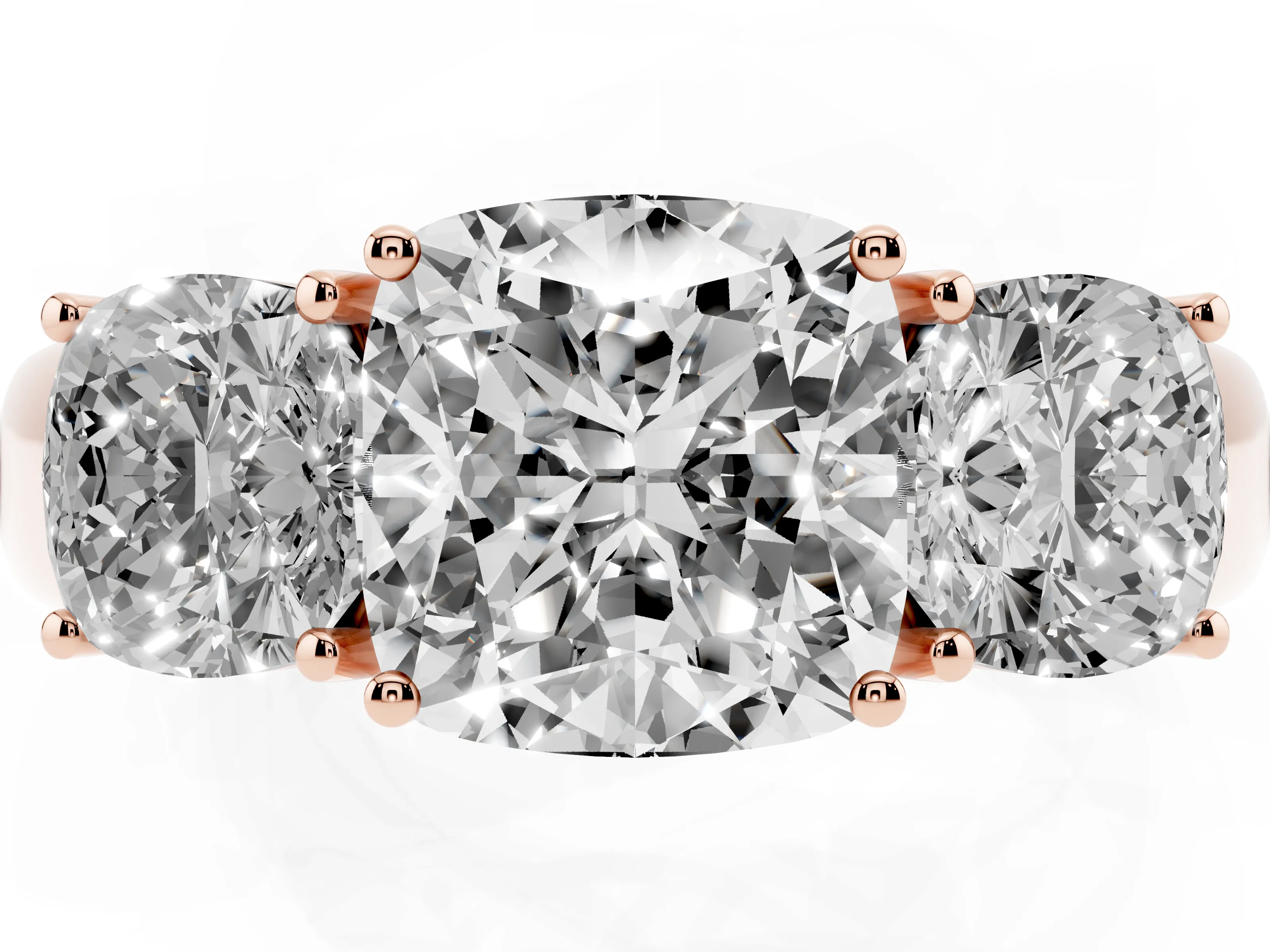 Three-Stone Cushion Cut Diamond Ring Set in Rose gold with Matching Prong Settings and Plain Band