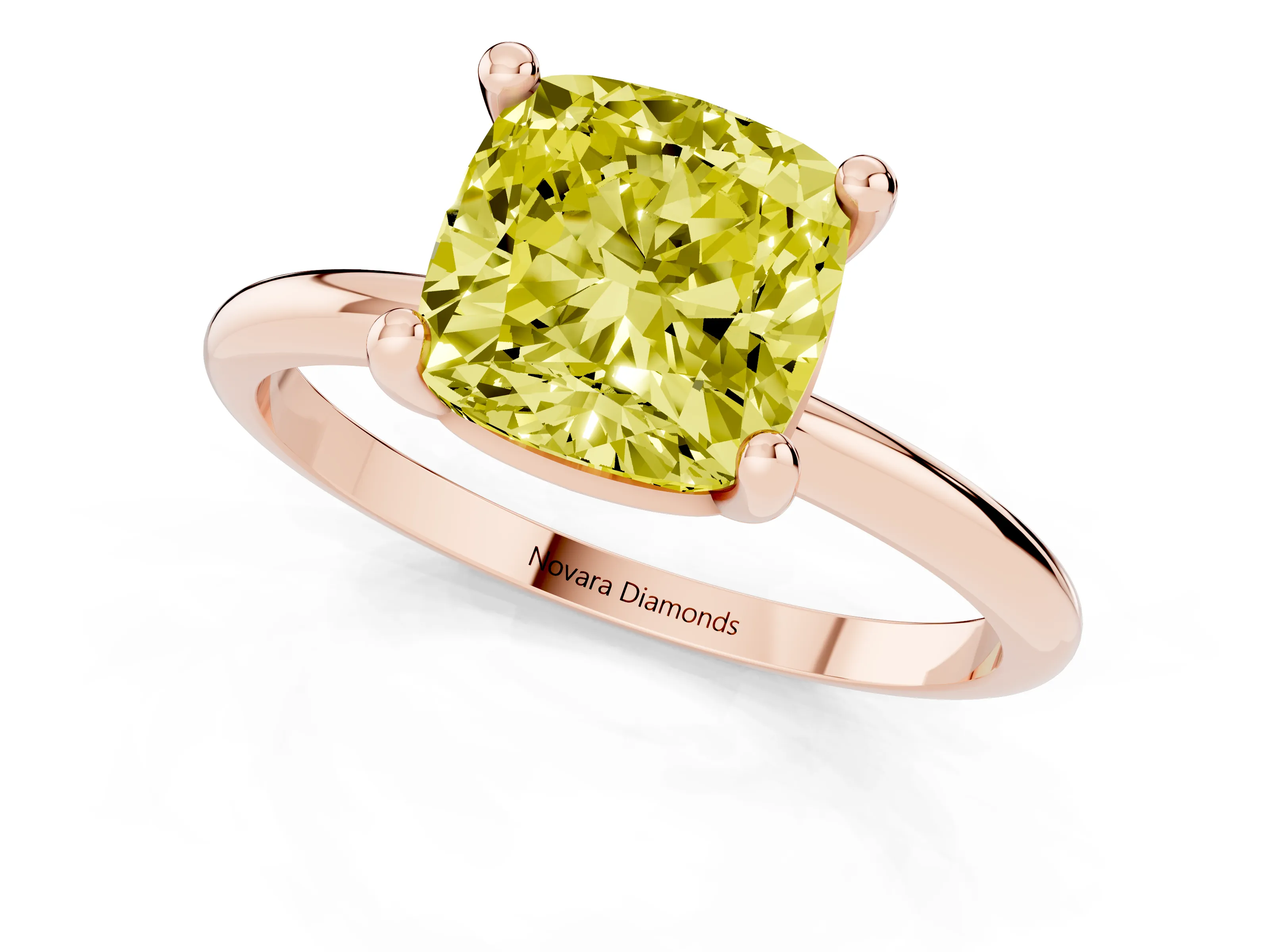 Fancy Yellow Cushion Cut Diamond Solitaire Ring Set in Rose gold with Secure Prong Setting on a Classic Band