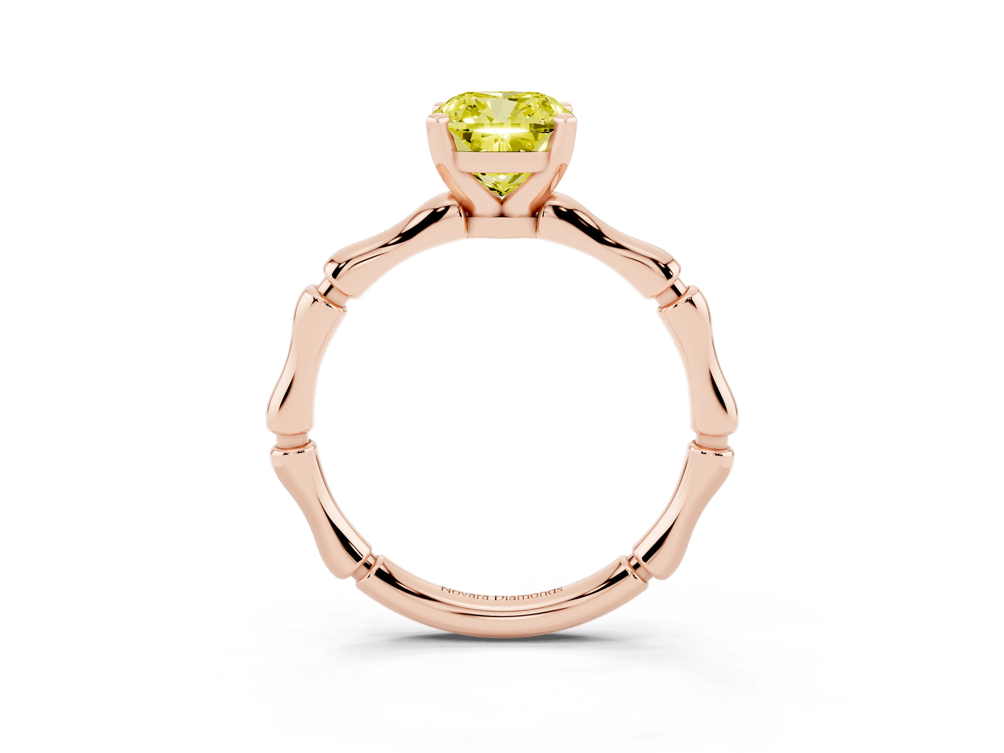 Fancy Yellow Cushion Cut Diamond Solitaire Ring Set in Rose gold with Bamboo Band and Prong Setting