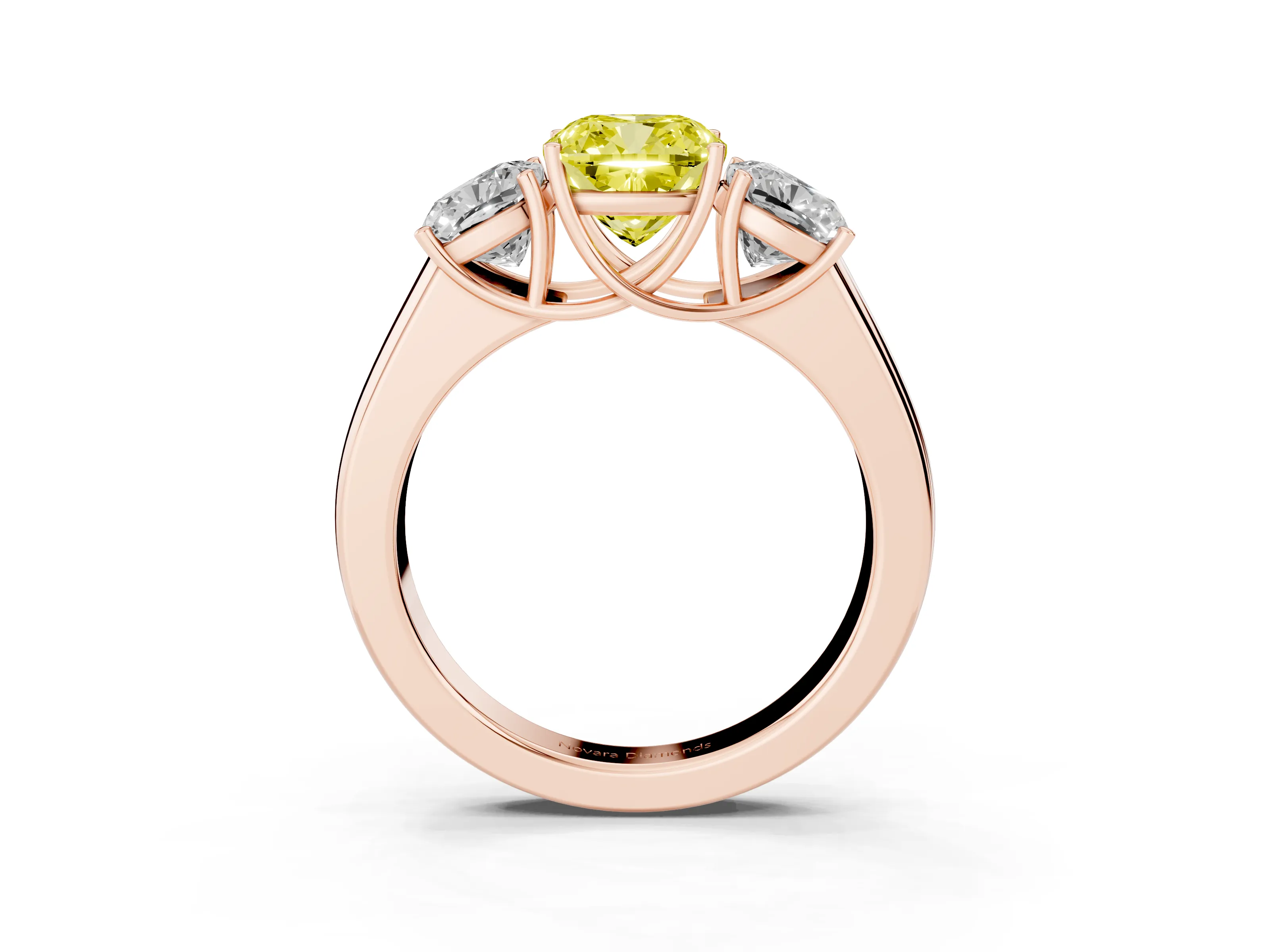 Fancy Yellow Three-Stone Cushion Cut Diamond Ring Set in Rose gold with Matching Prong Settings and Plain Band