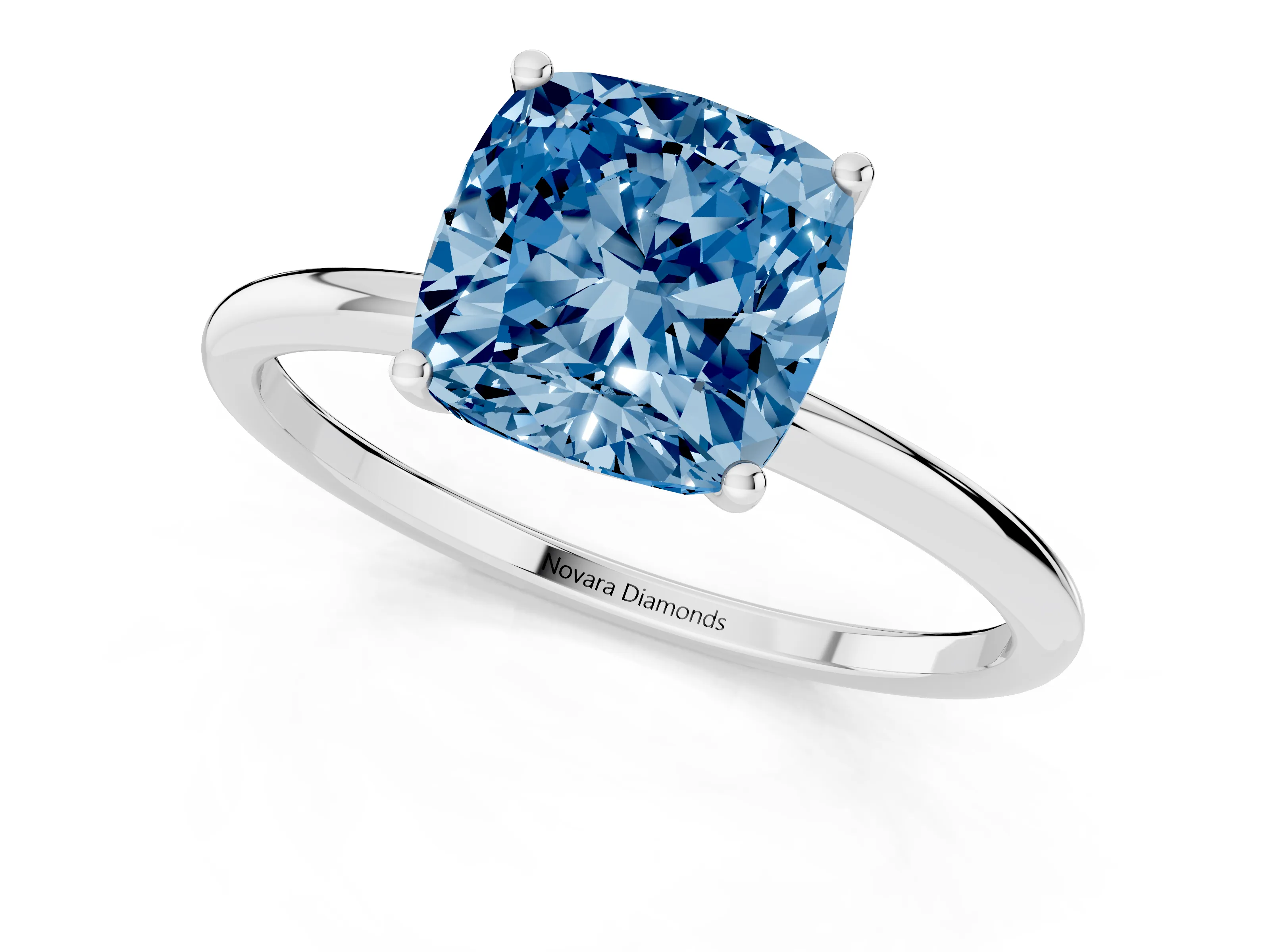 Fancy Blue Cushion Cut Diamond Solitaire Engagement Ring Set in Platinum with Thin Band and Prong Setting