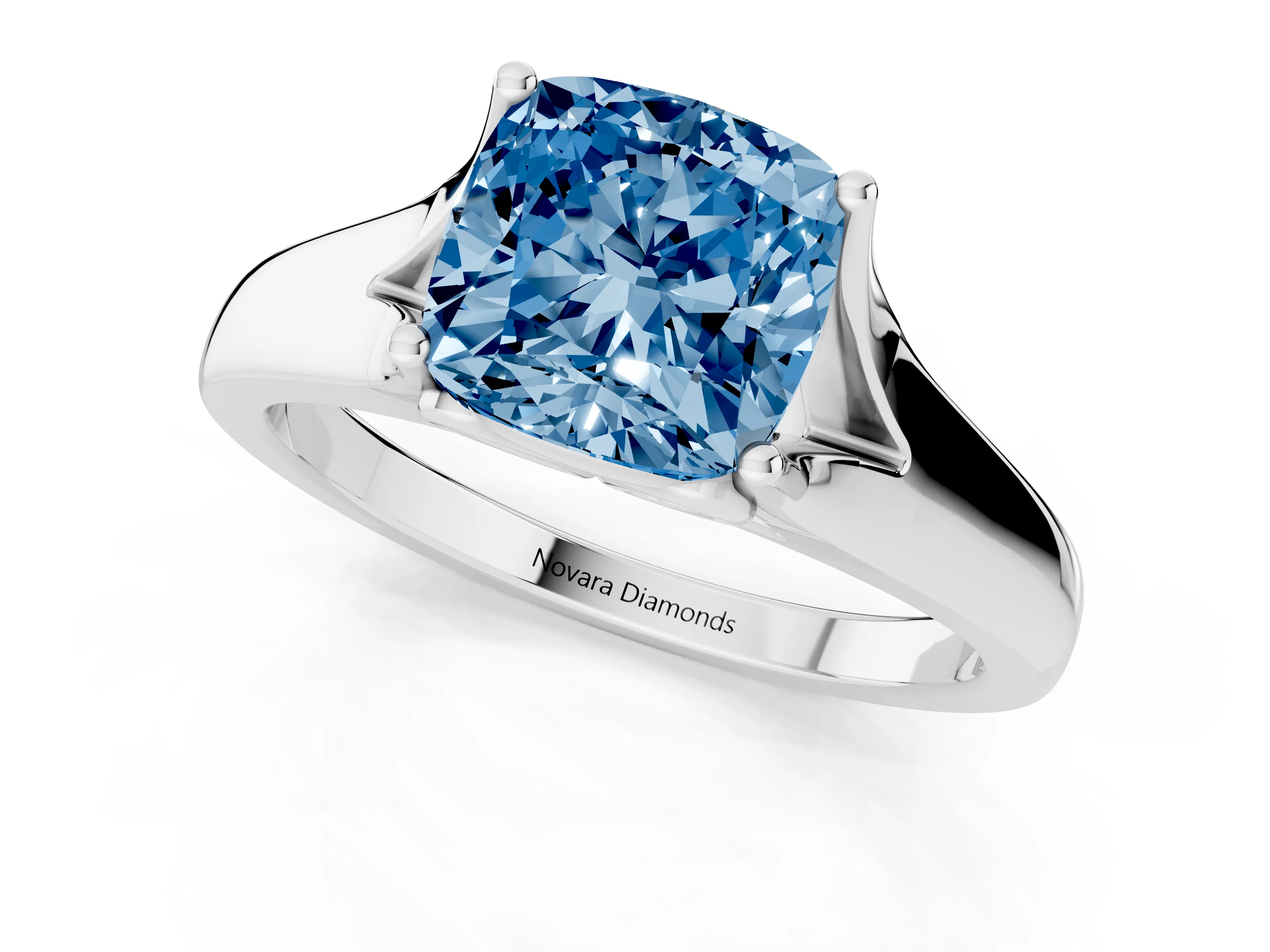Fancy Blue Cushion Cut Diamond Solitaire Ring Set in White gold with Arched Cathedral Band and Prong Setting
