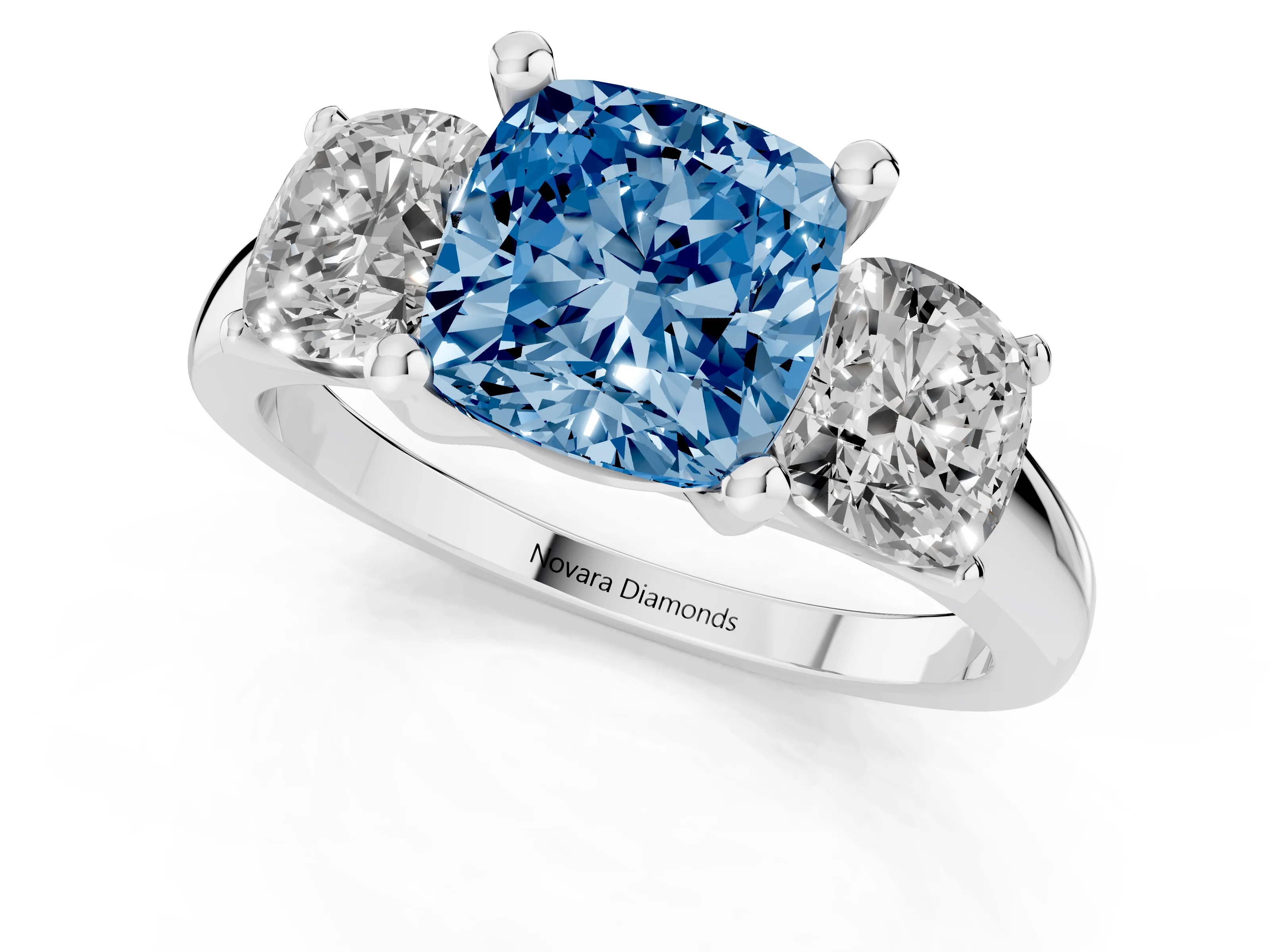 Fancy Blue Cushion Cut Diamond Three-Stone Ring Set in White gold with Classic Prong Setting and Plain Band