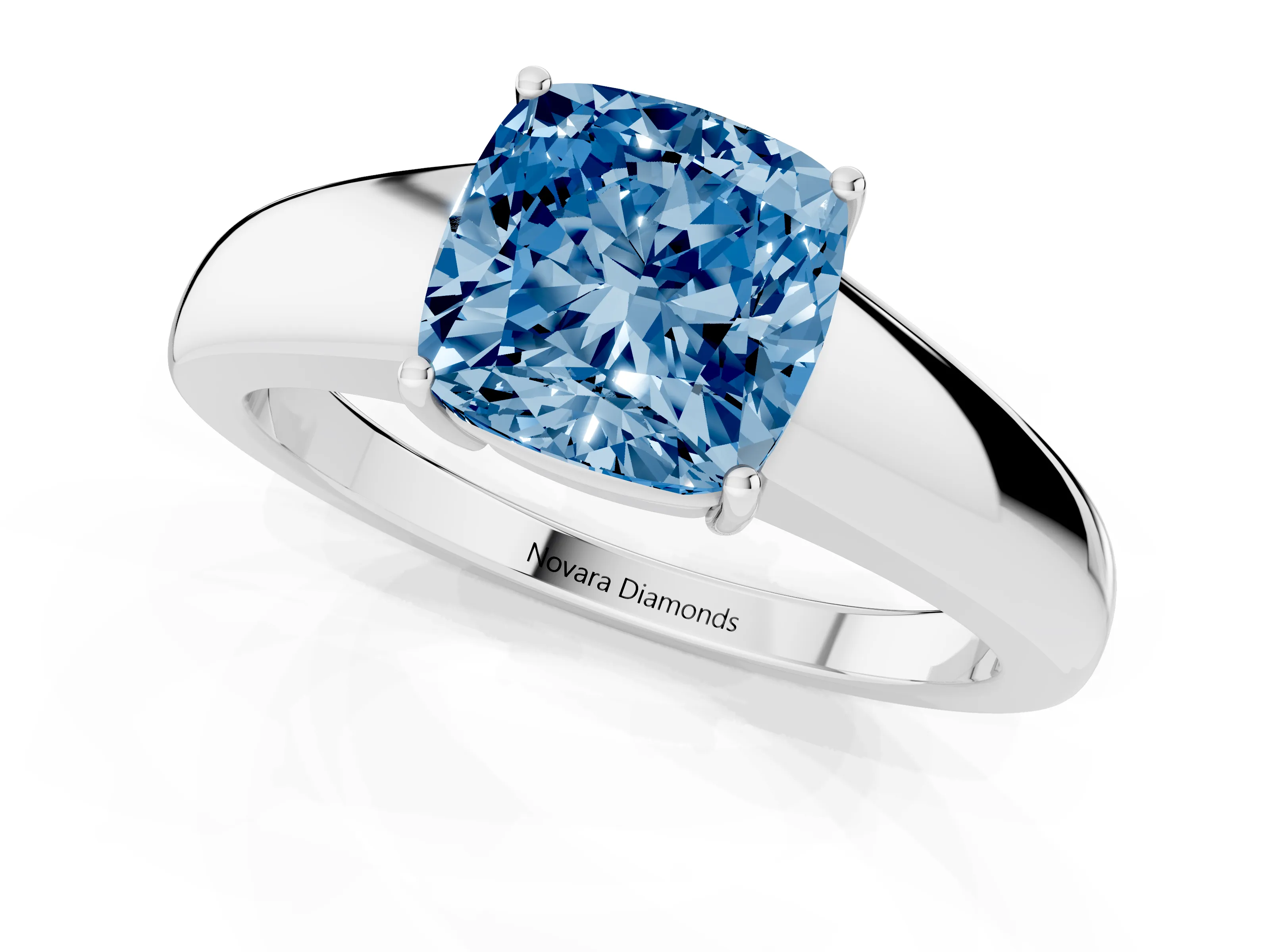 Fancy Blue Cushion Cut Diamond Solitaire Ring Set in White gold with Tapered Band and Prong Setting