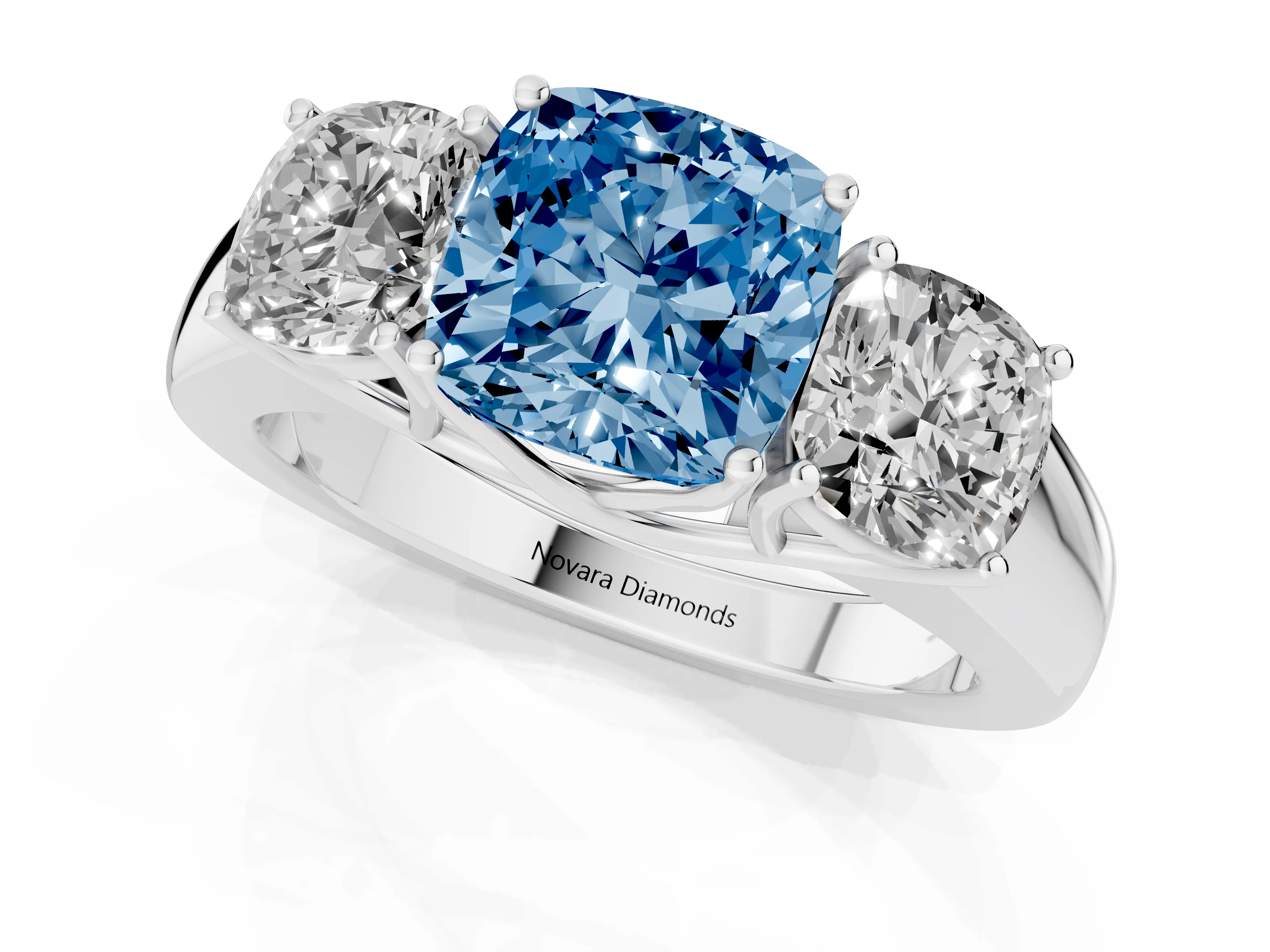 Fancy Blue Three-Stone Cushion Cut Diamond Ring Set in Silver with Matching Prong Settings and Plain Band