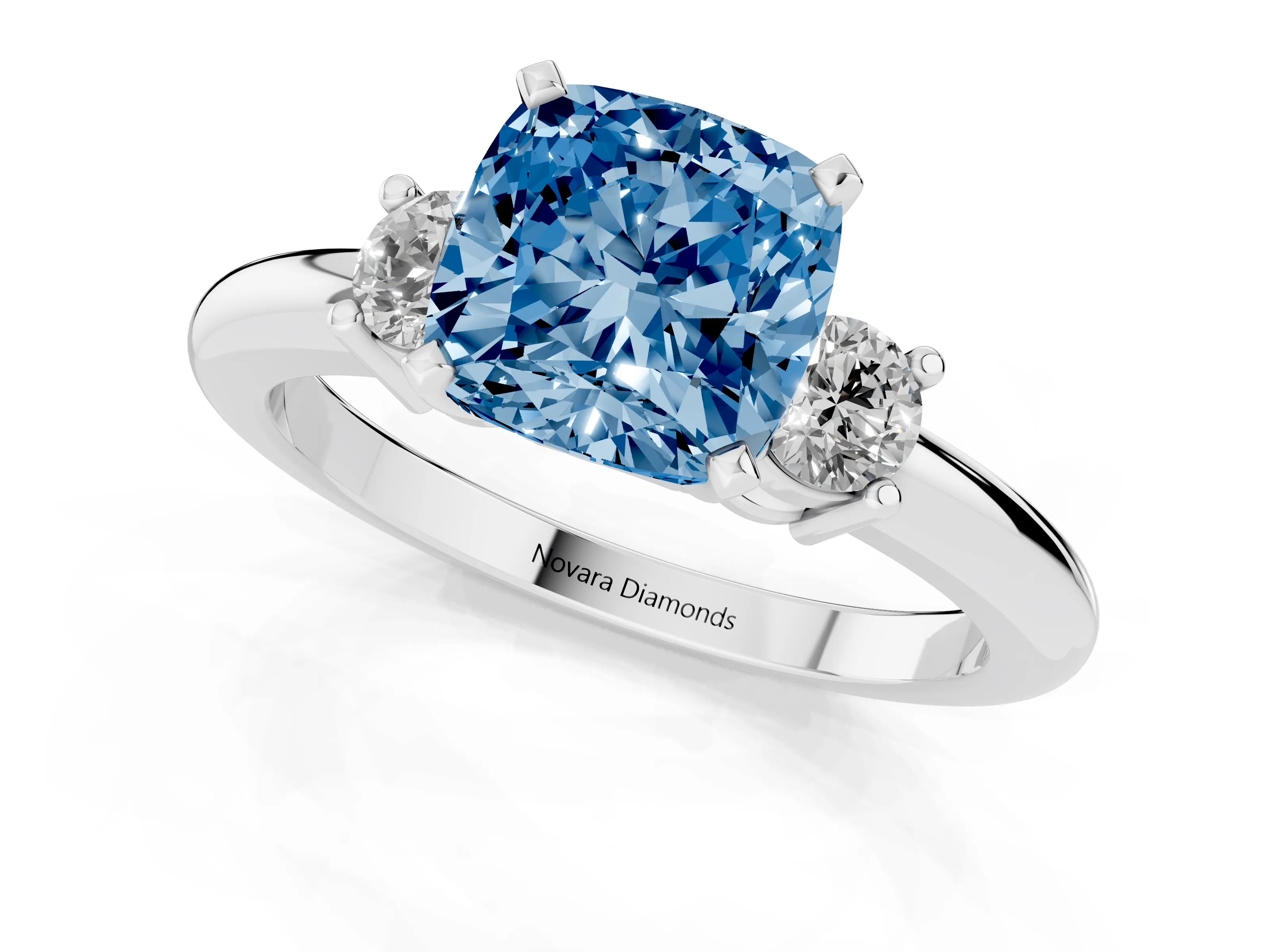 Fancy Blue Three-Stone Cushion Cut Diamond Ring Set in Silver with Prong Setting and Plain Band