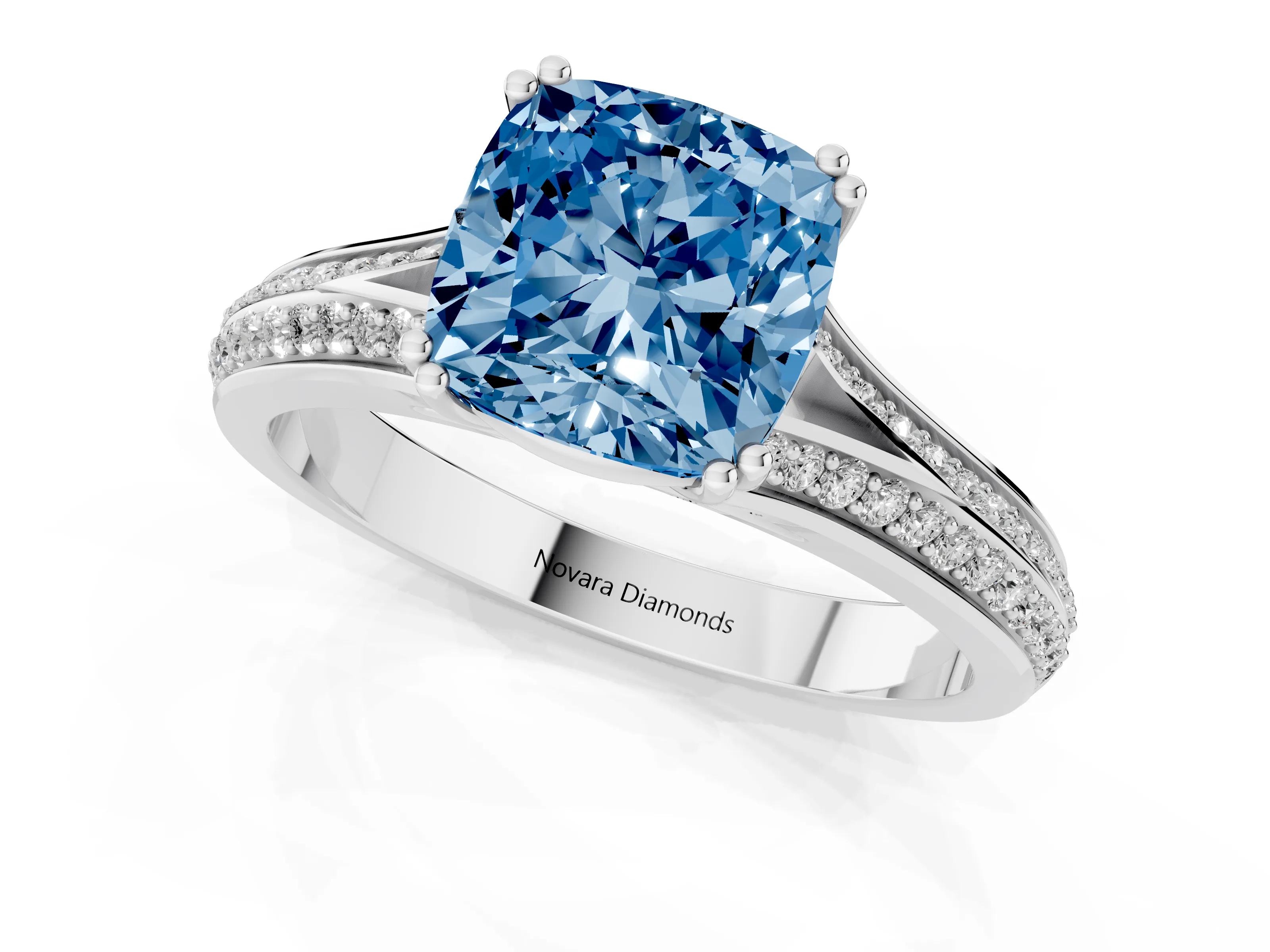 Fancy Blue Cushion Cut Diamond Split Shank Pavé Engagement Ring Set in White gold with Prong-Set Center Stone