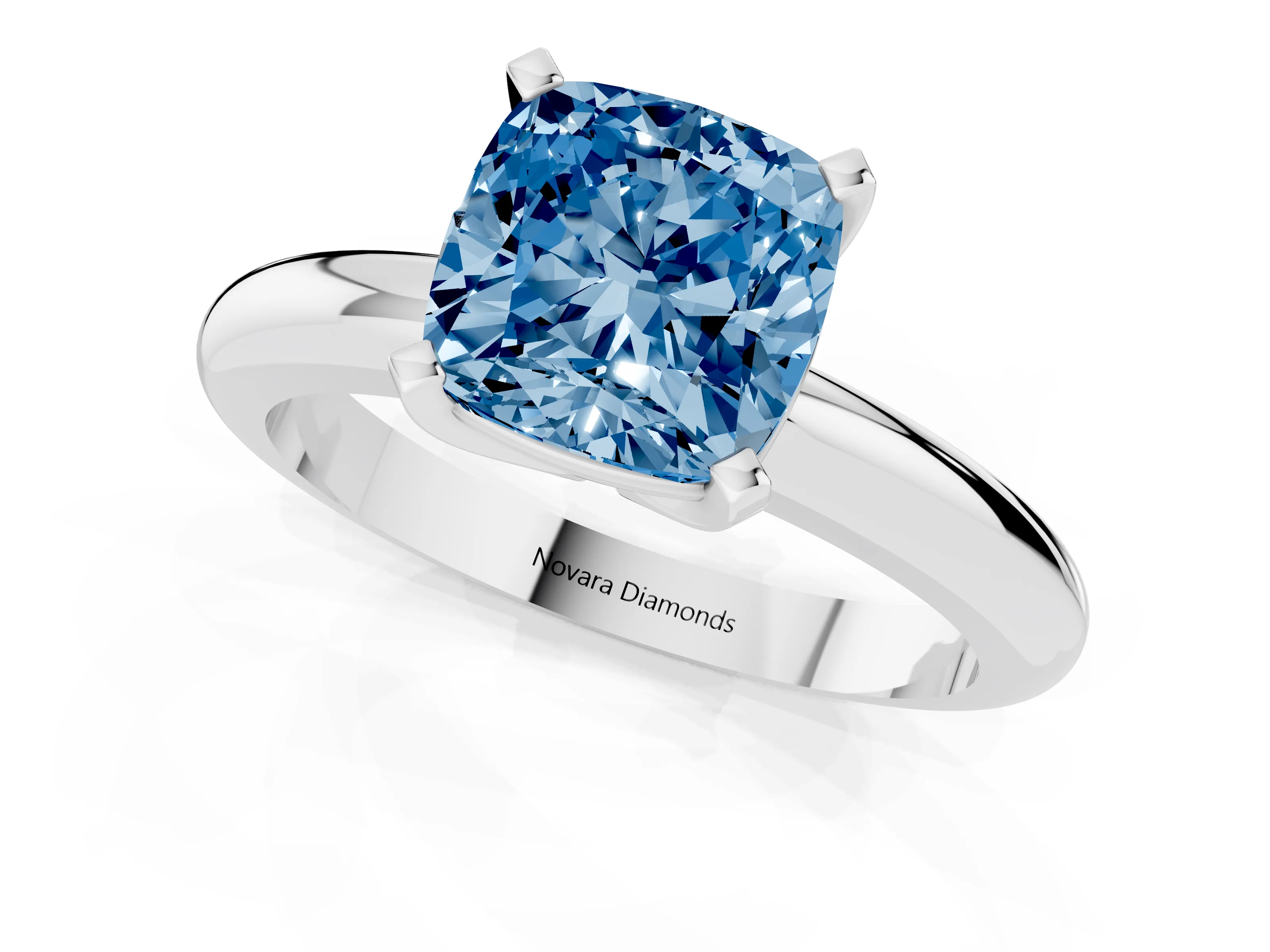 Fancy Blue Cushion Cut Diamond Solitaire Engagement Ring Set in White gold with Round Band and Prong Setting