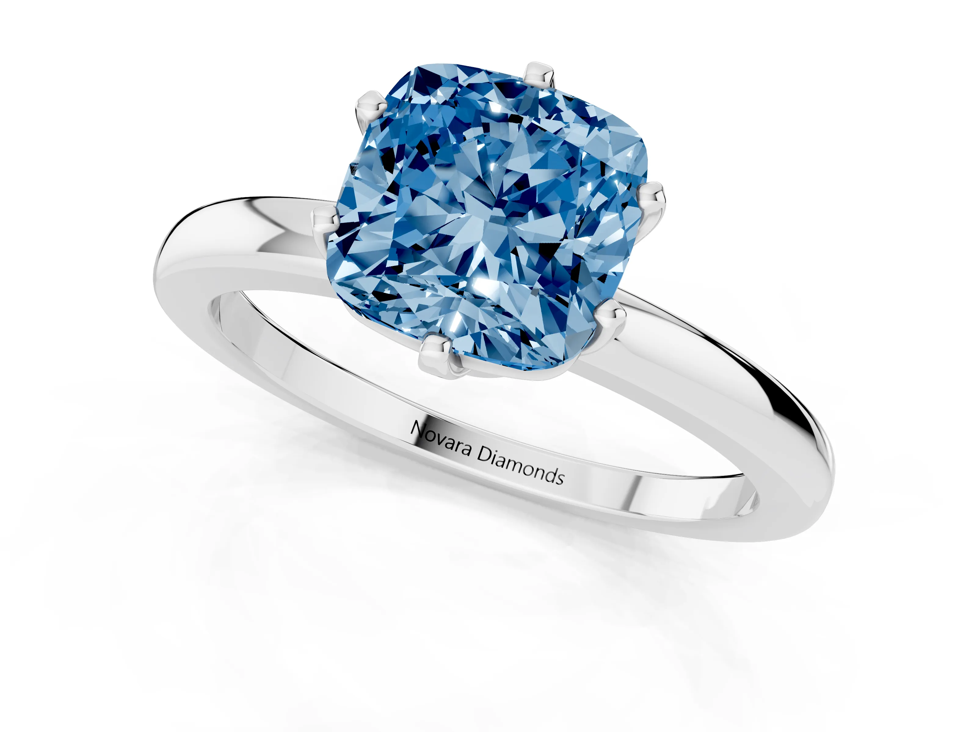 Fancy Blue Cushion Cut Diamond Solitaire Ring Set in Silver with Raised Prong Setting on a Classic Band