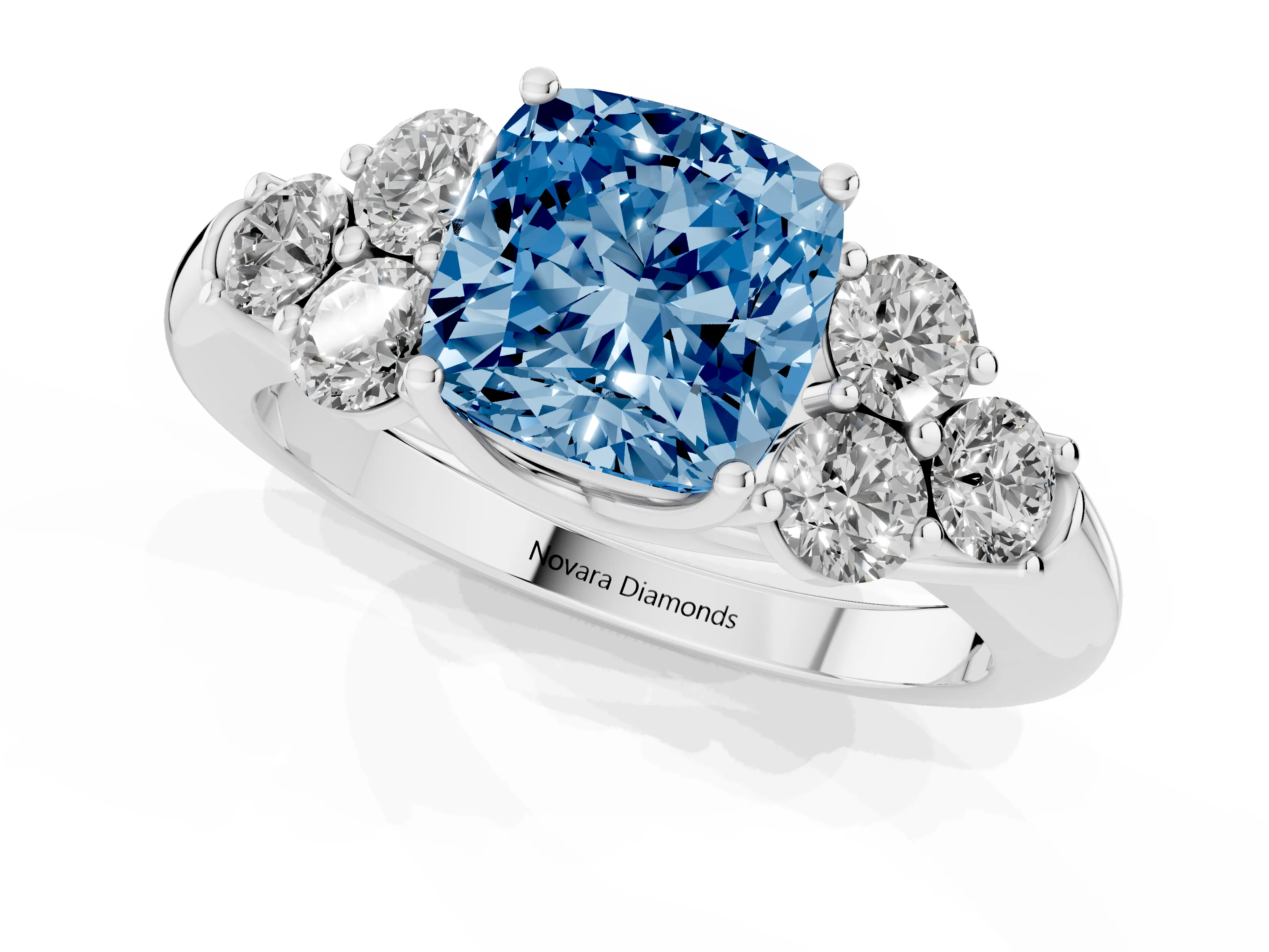 Fancy Blue Cushion Cut Diamond Cluster Ring Set in Platinum with Round Accent Stones and Prong Setting on a Plain Band