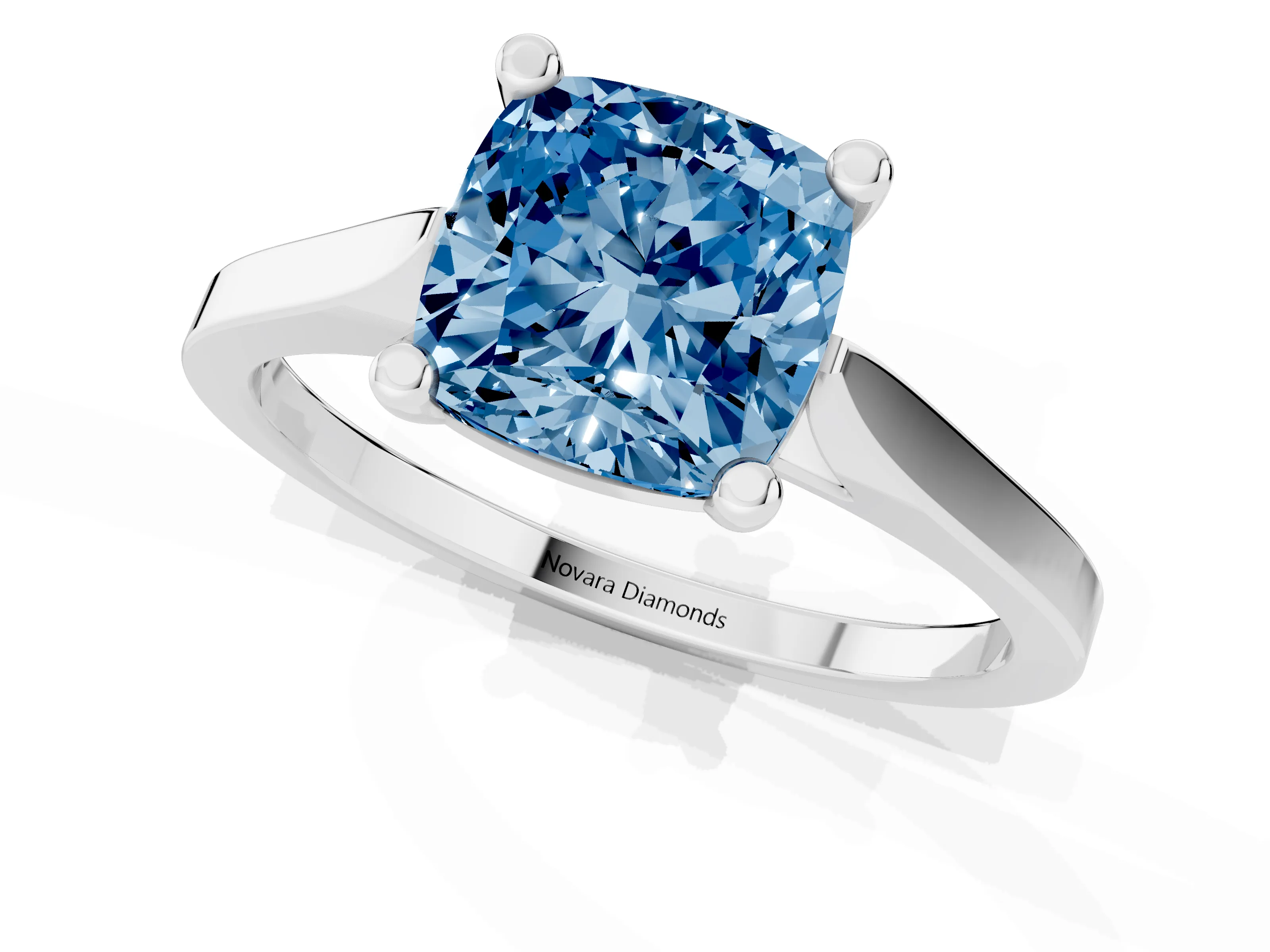 Fancy Blue Cushion Cut Diamond Solitaire Ring Set in White gold with Prong Setting and Tapered Band