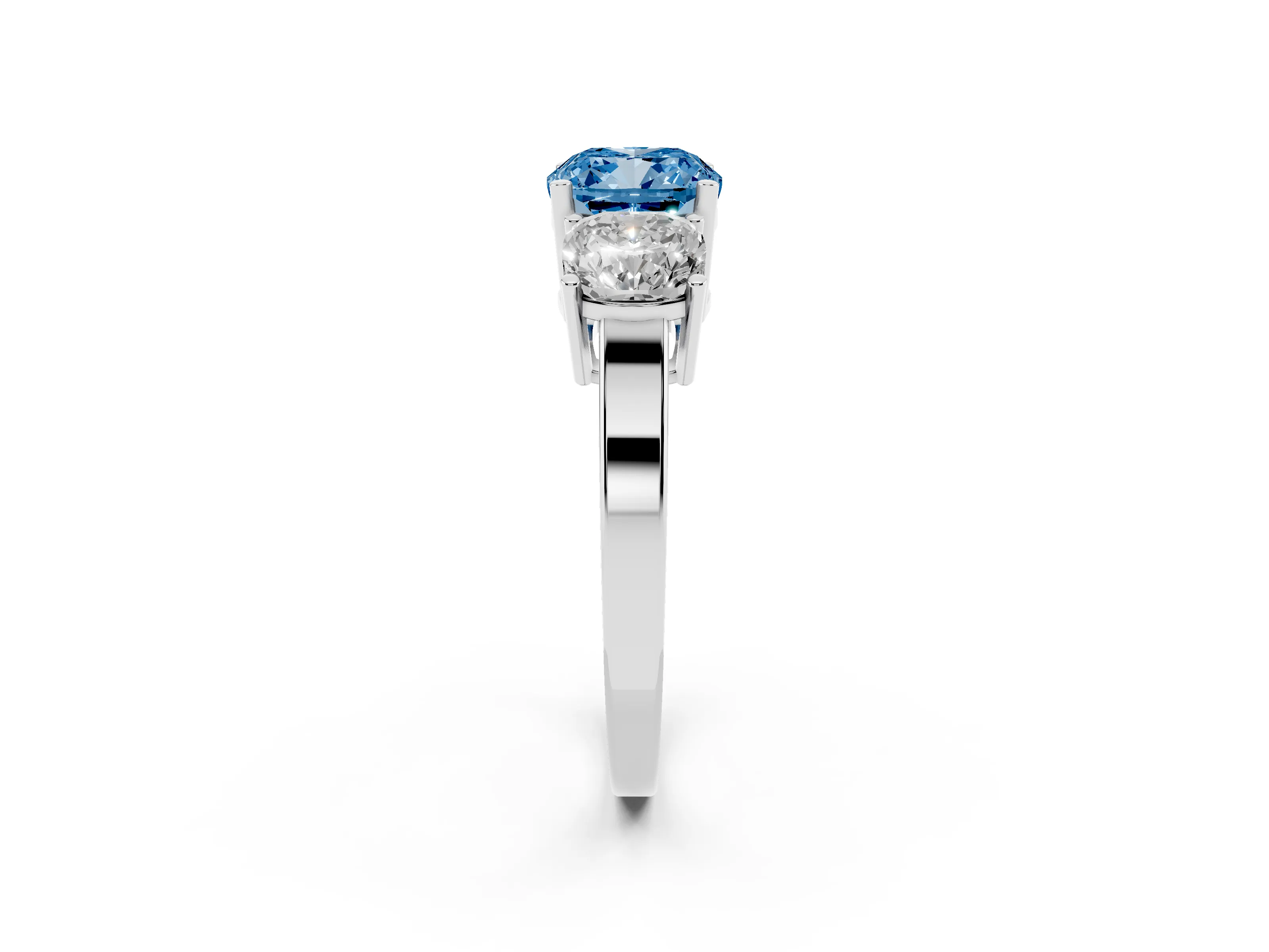 Fancy Blue Cushion Cut Diamond Three-Stone Engagement Ring Set in White gold with Flat Band