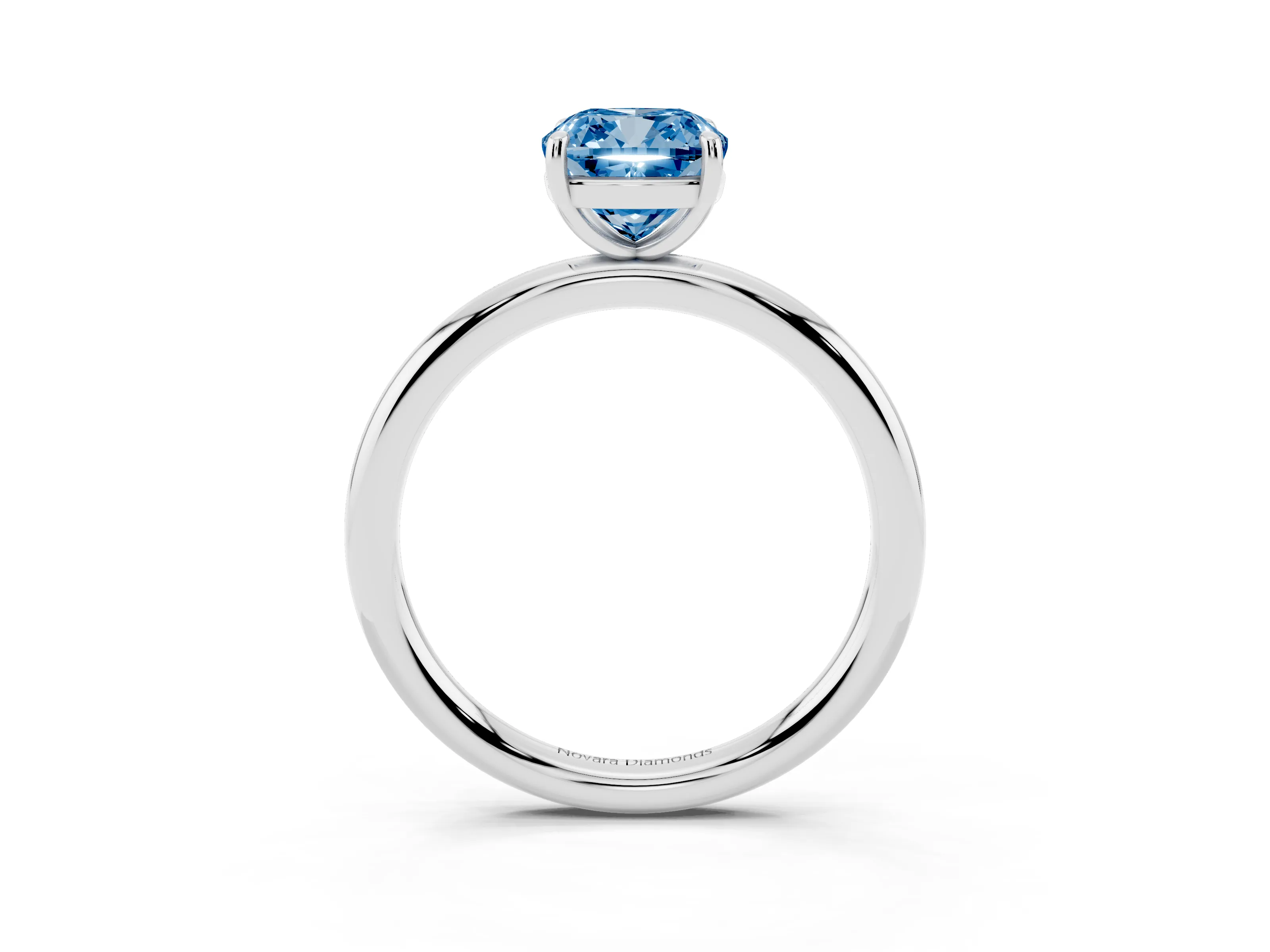 Fancy Blue Cushion Cut Diamond Solitaire Ring Set in Silver with Prong Setting on a Polished Plain Band
