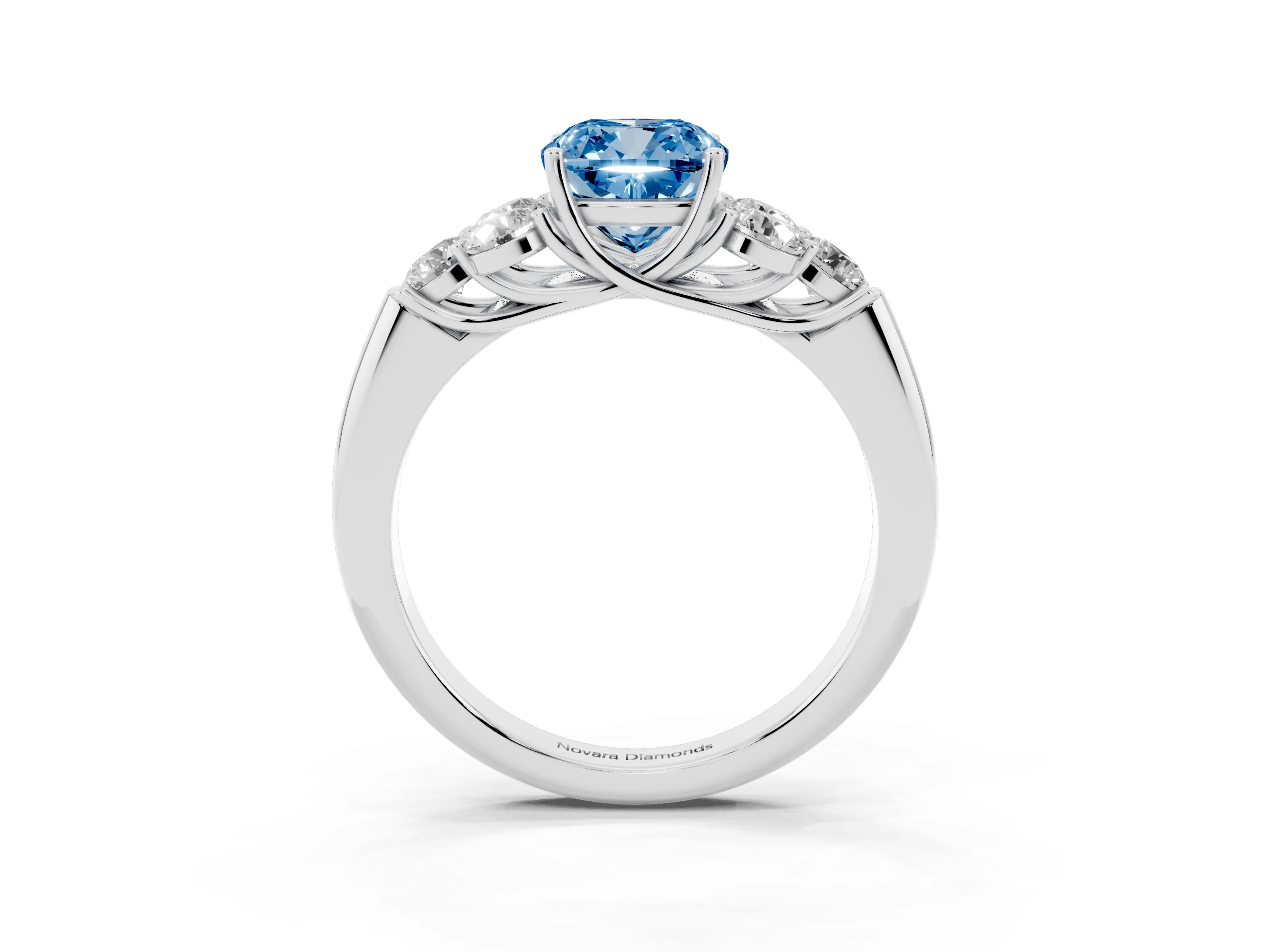 Fancy Blue Cushion Cut Diamond Cluster Ring Set in Platinum with Round Accent Stones and Prong Setting on a Plain Band
