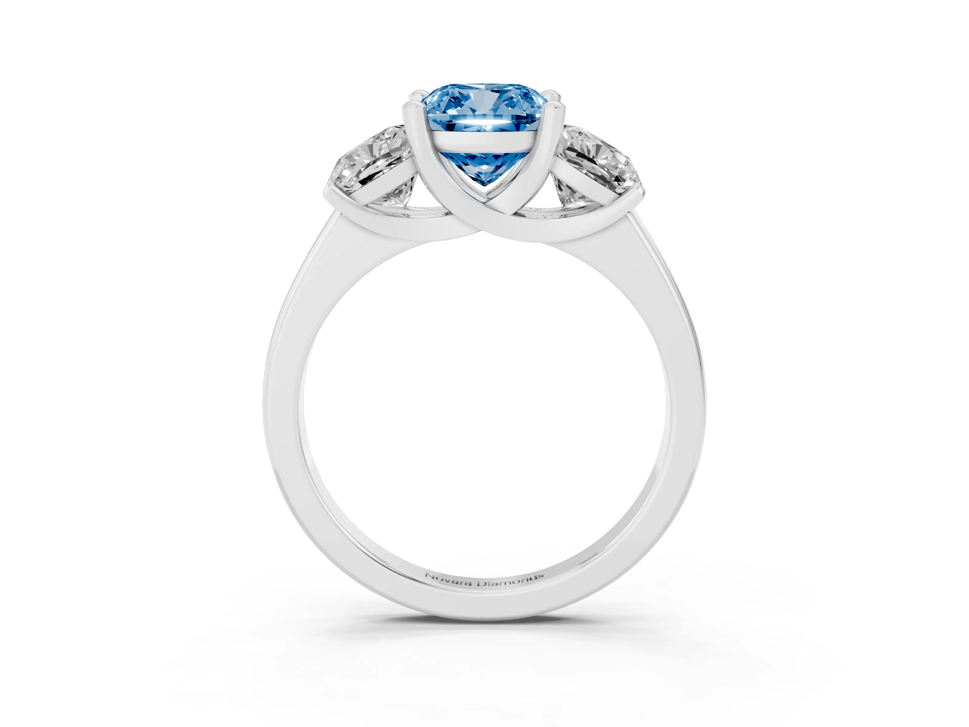 Fancy Blue Cushion Cut Diamond Three-Stone Ring Set in White gold with Classic Prong Setting and Plain Band
