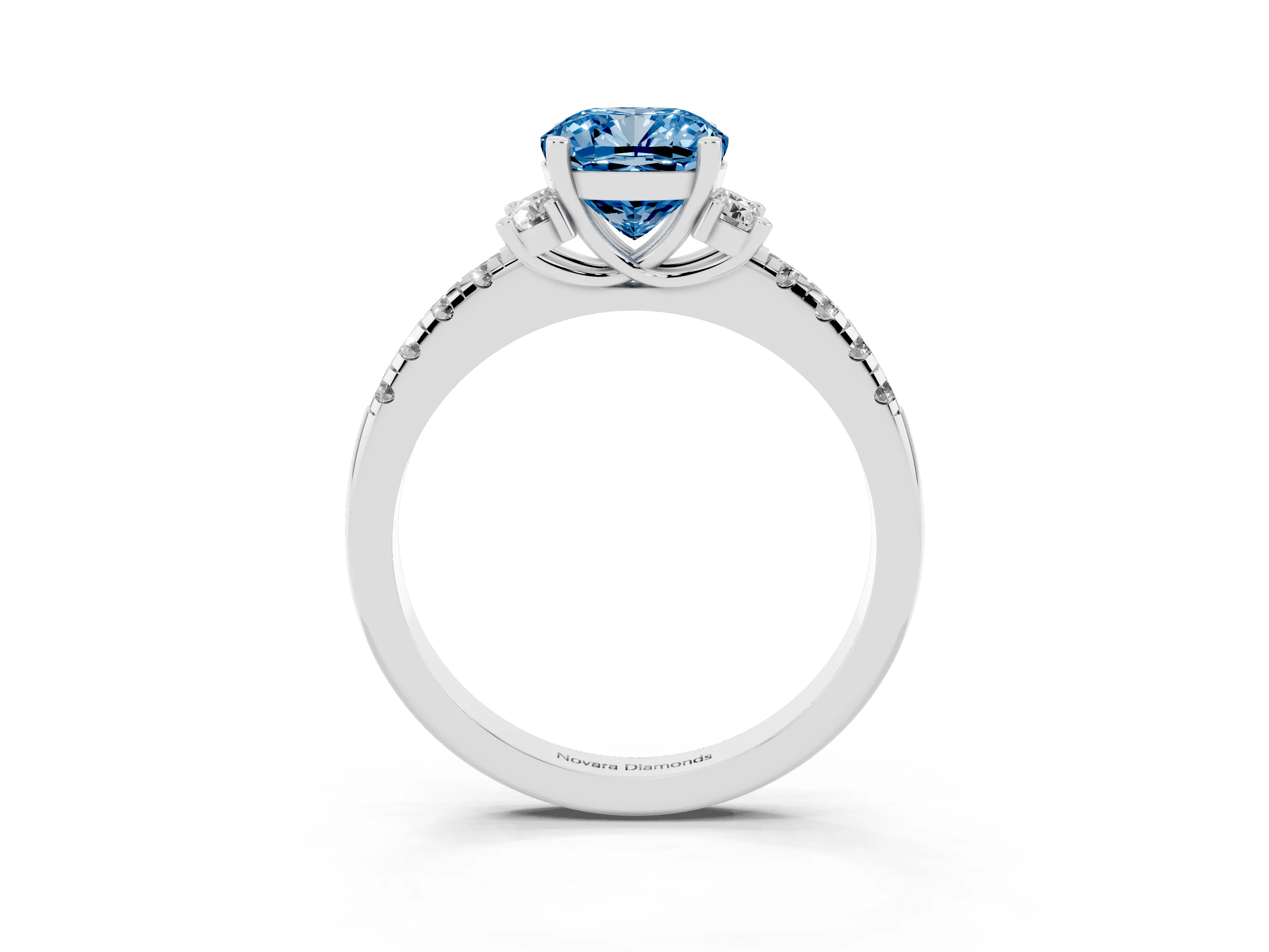 Fancy Blue Cushion Cut Diamond Three-Stone Pavé Ring Set in White gold with Prong Setting