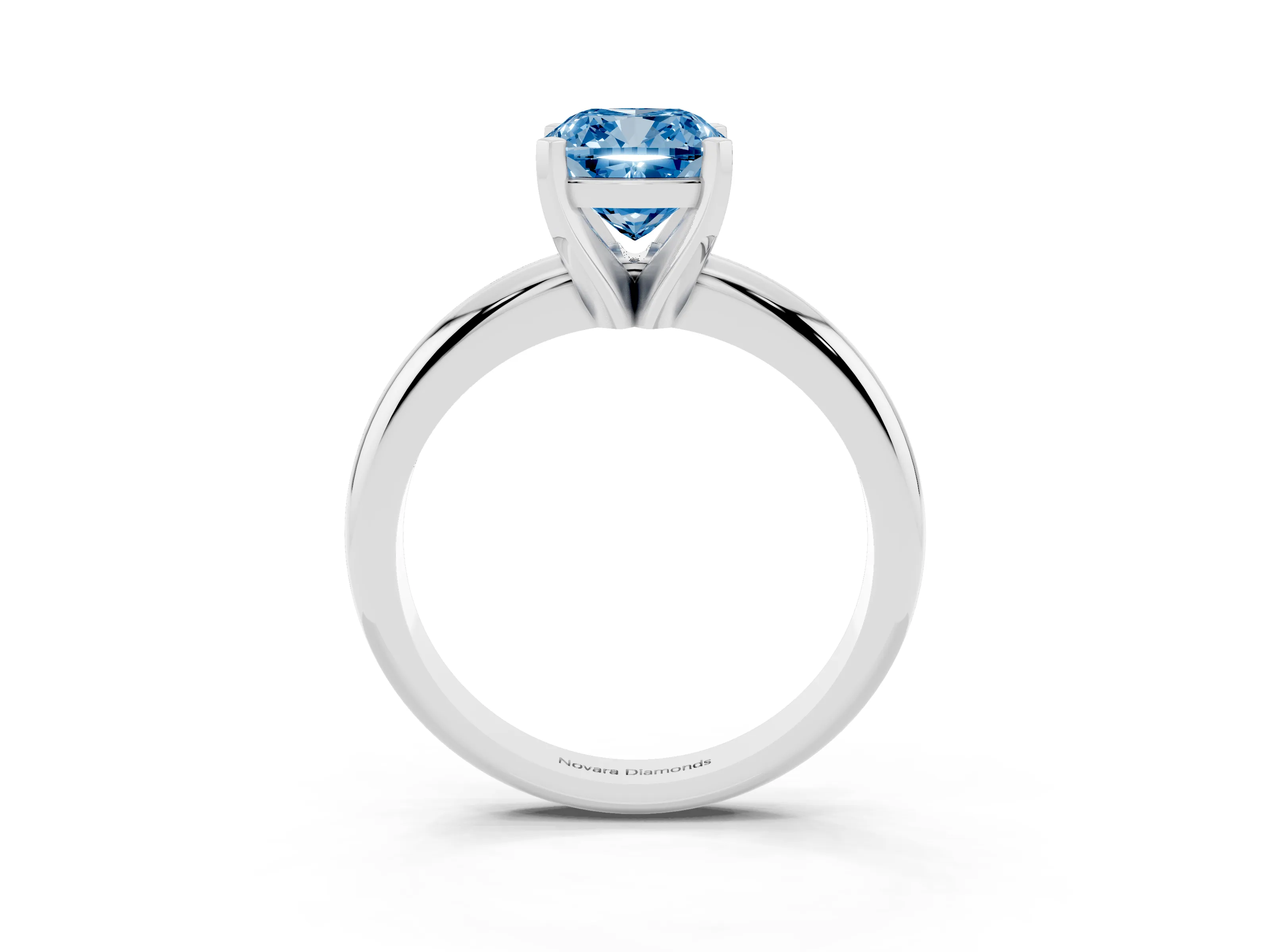 Fancy Blue Cushion Cut Diamond Solitaire Engagement Ring Set in White gold with Round Band and Prong Setting