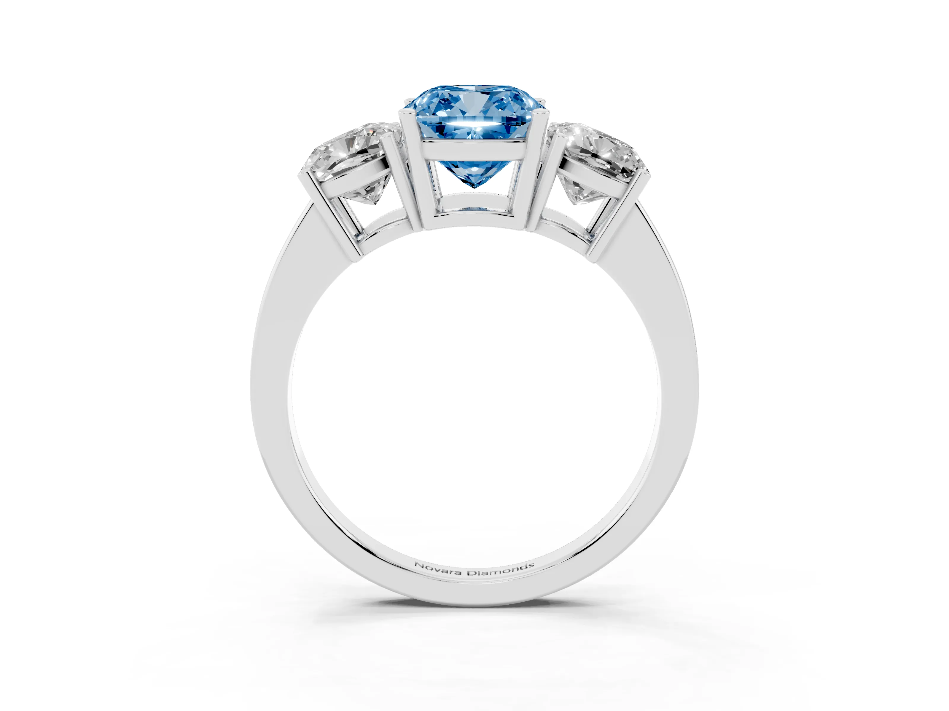 Fancy Blue Cushion Cut Diamond Three-Stone Engagement Ring Set in White gold with Flat Band