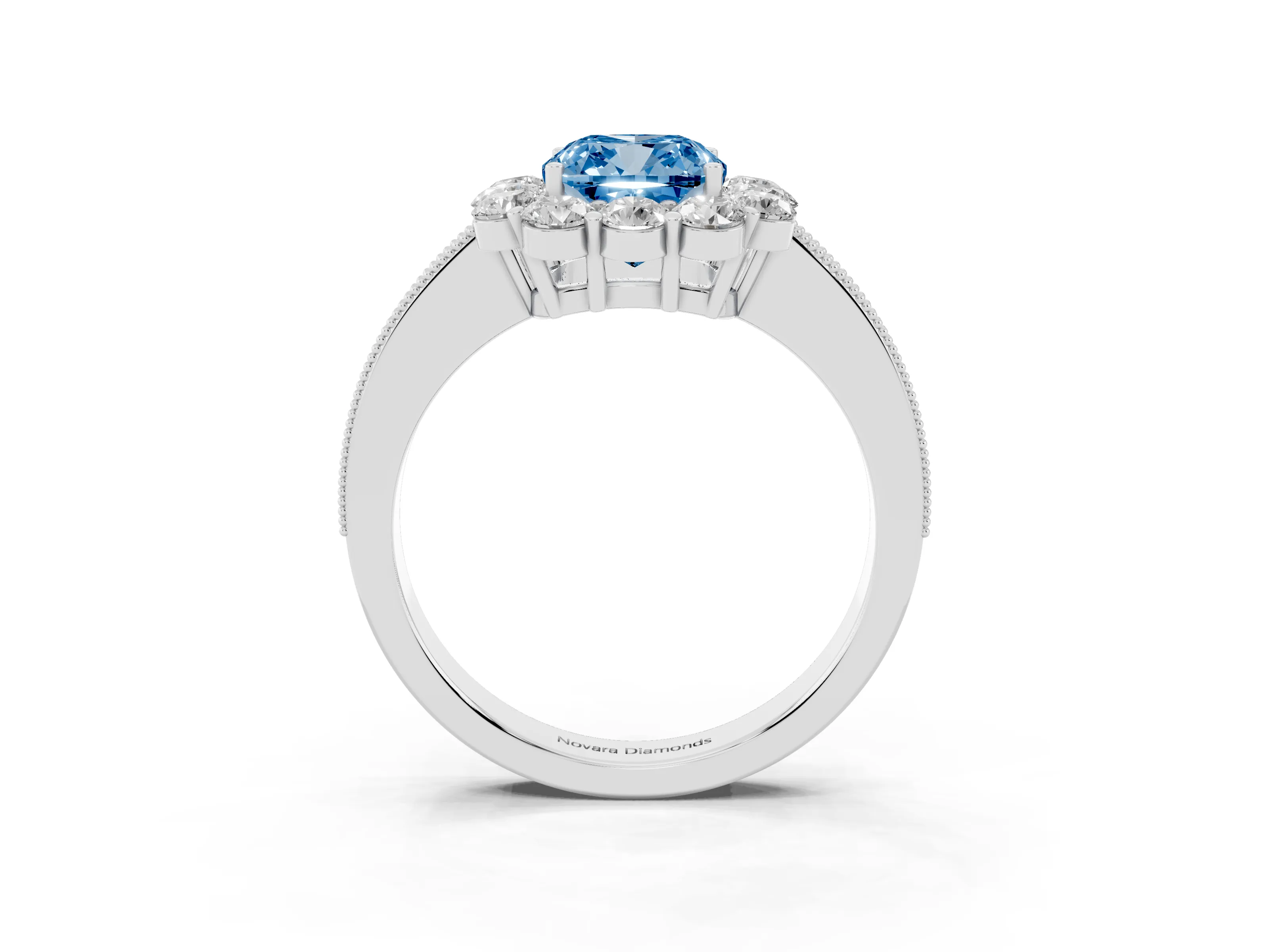 Fancy Blue Cushion Cut Diamond Halo Pavé Engagement Ring Set in White gold with Milgrain Detailing