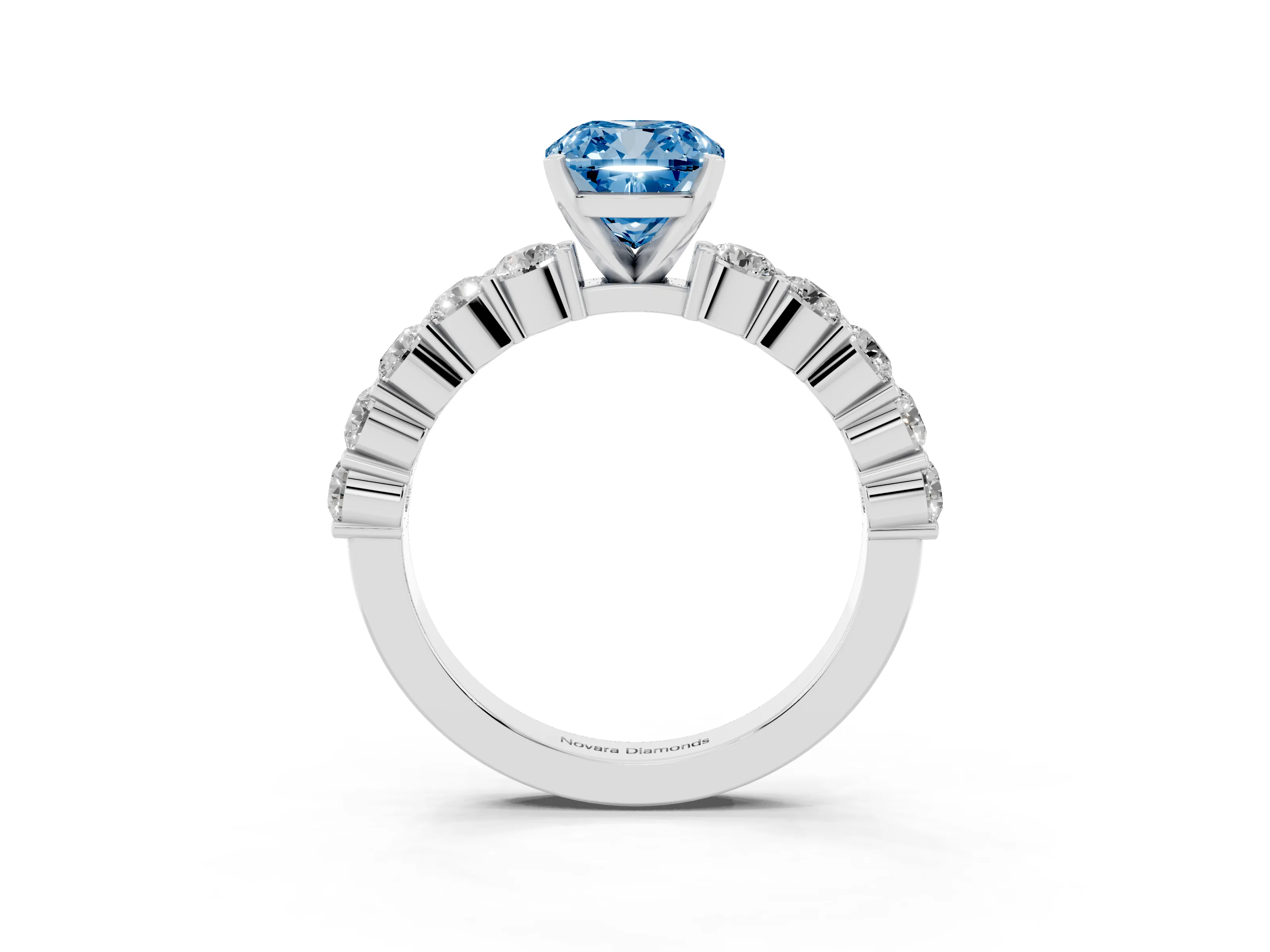 Fancy Blue Cushion Cut Diamond Solitaire Ring Set in White gold with Shared Prong Round Side Stones
