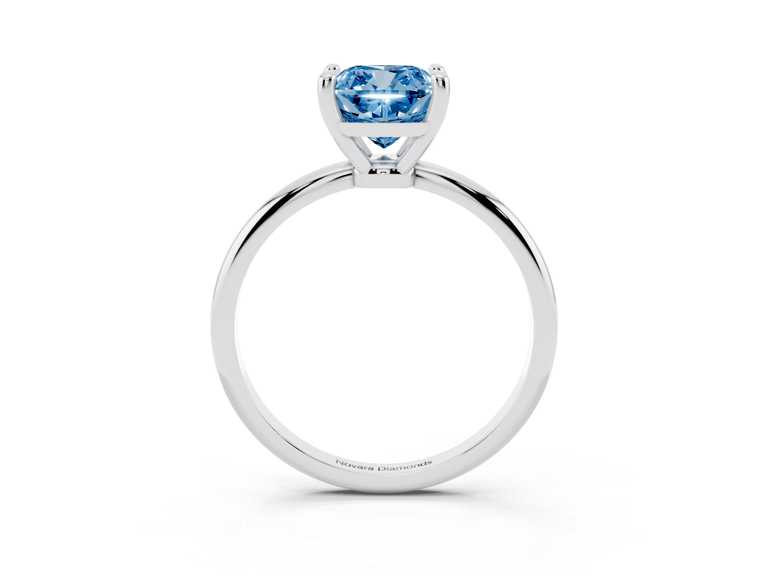 Fancy Blue Cushion Cut Diamond Solitaire Ring Set in White gold with Secure Prong Setting on a Classic Band