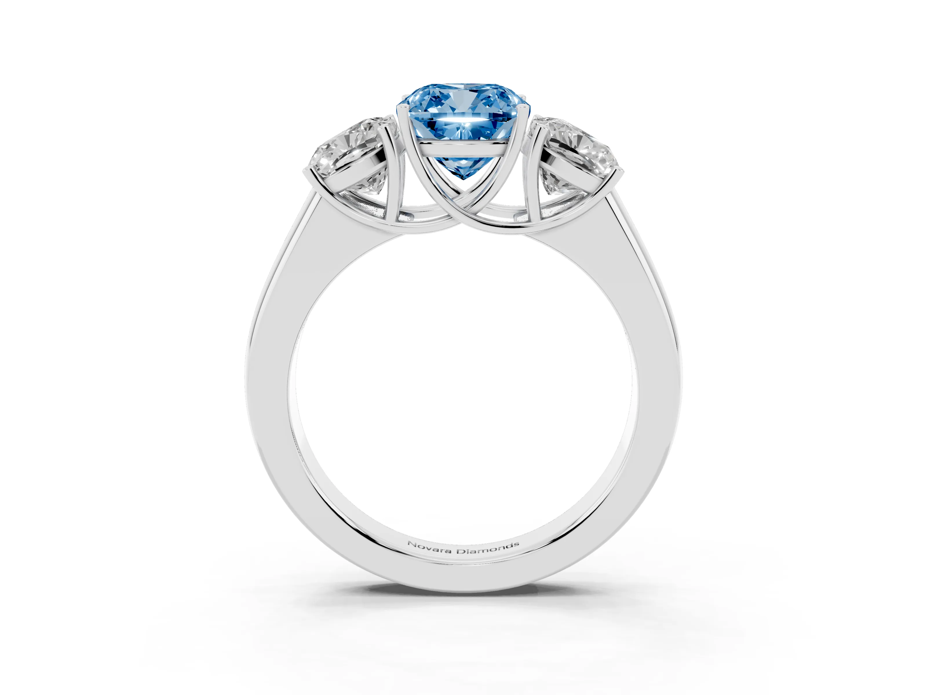 Fancy Blue Three-Stone Cushion Cut Diamond Ring Set in Silver with Matching Prong Settings and Plain Band