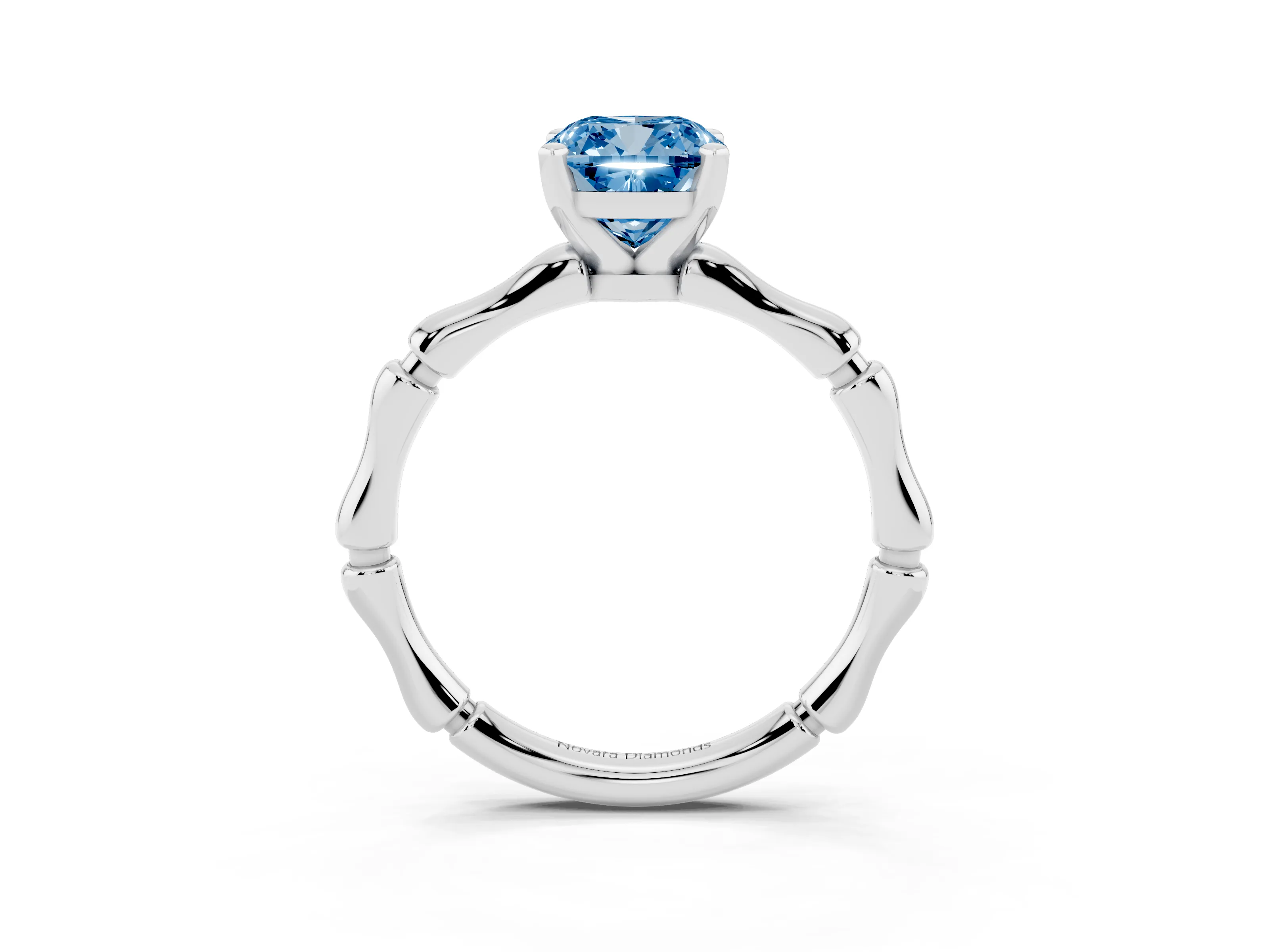 Fancy Blue Cushion Cut Diamond Solitaire Ring Set in White gold with Bamboo Band and Prong Setting