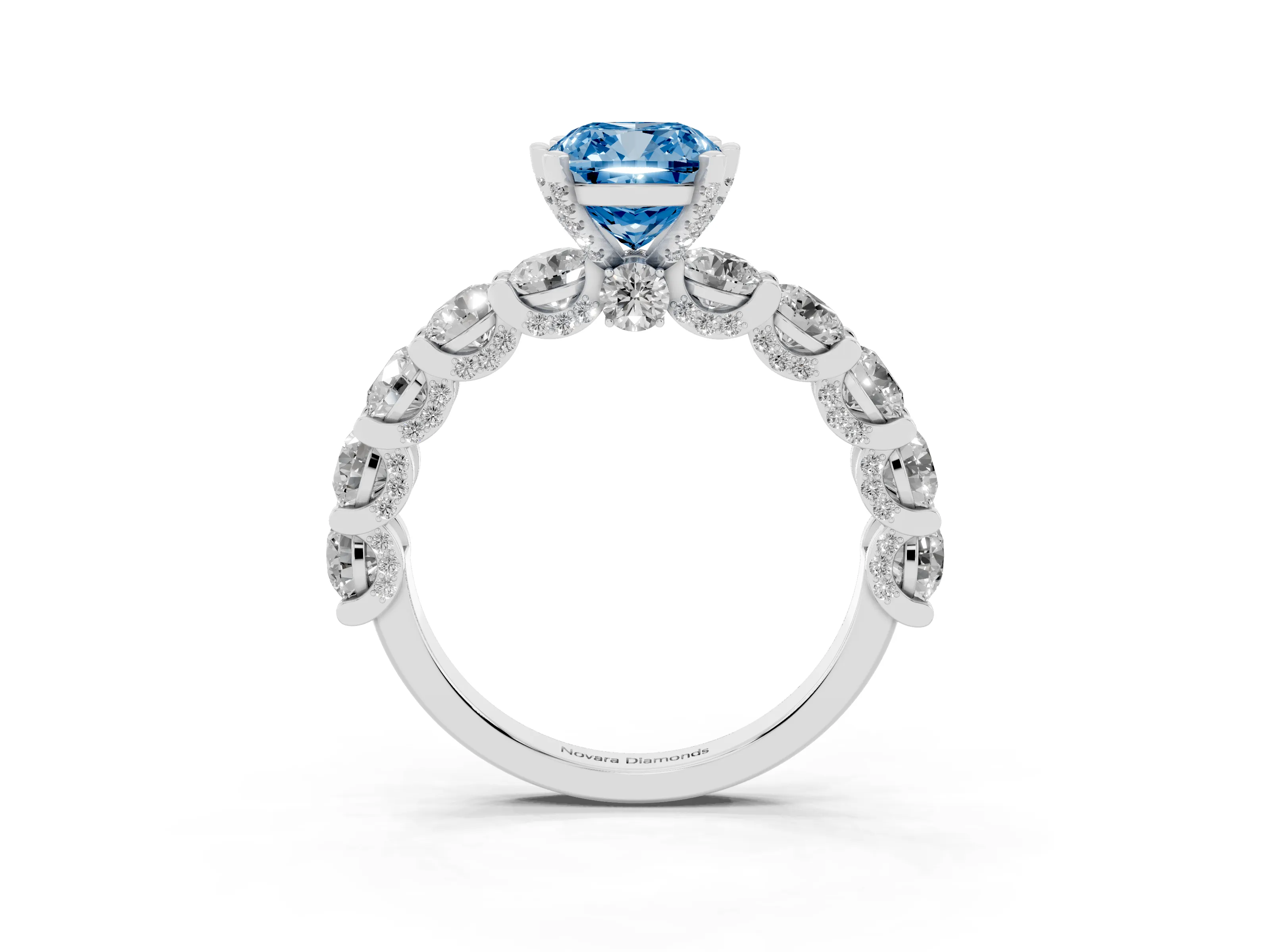 Fancy Blue Cushion Cut Diamond Side Stone Ring Set in Platinum with Alternating Round and Oval Side Stones