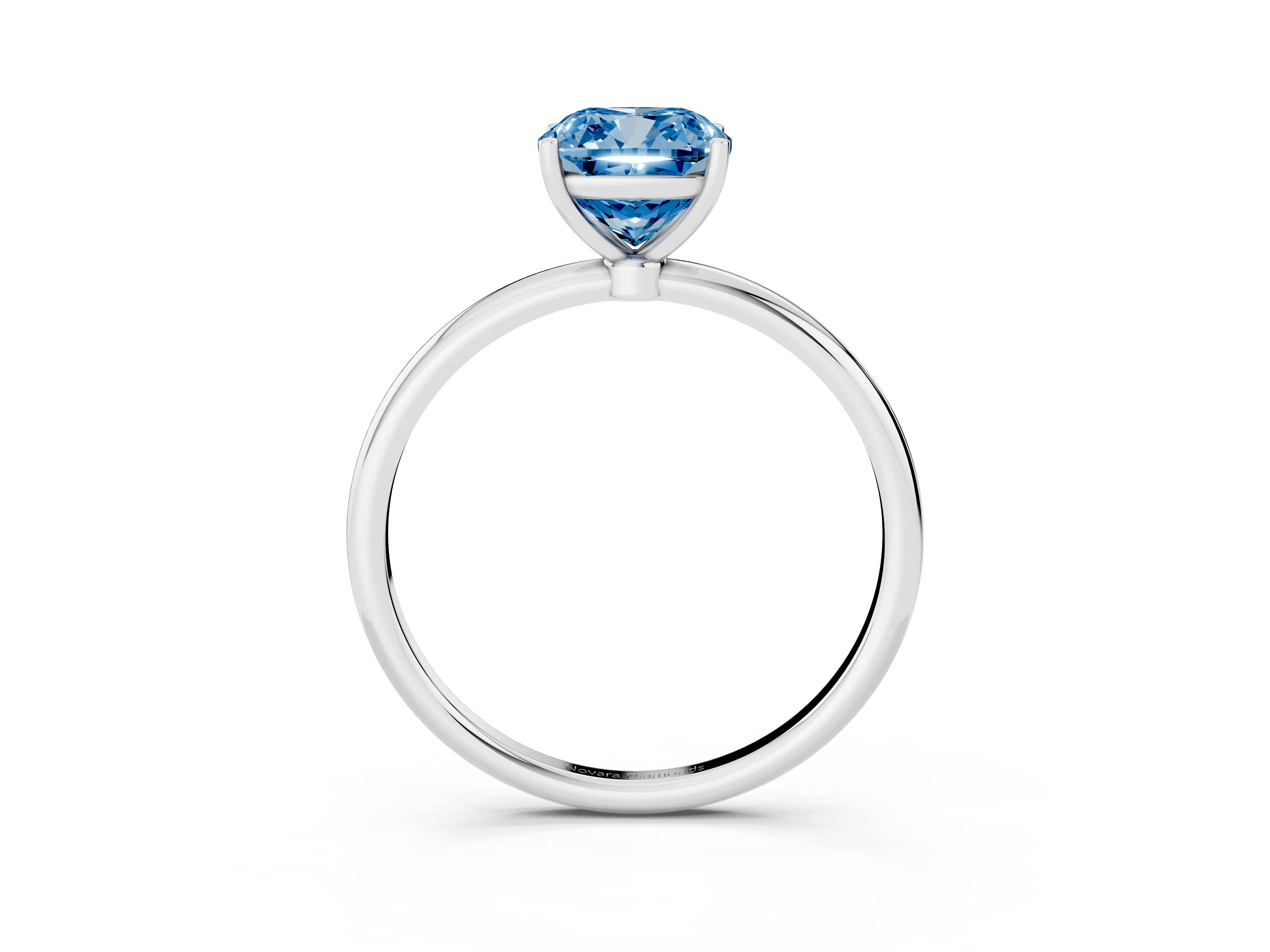 Fancy Blue Cushion Cut Diamond Solitaire Engagement Ring Set in Platinum with Thin Band and Prong Setting