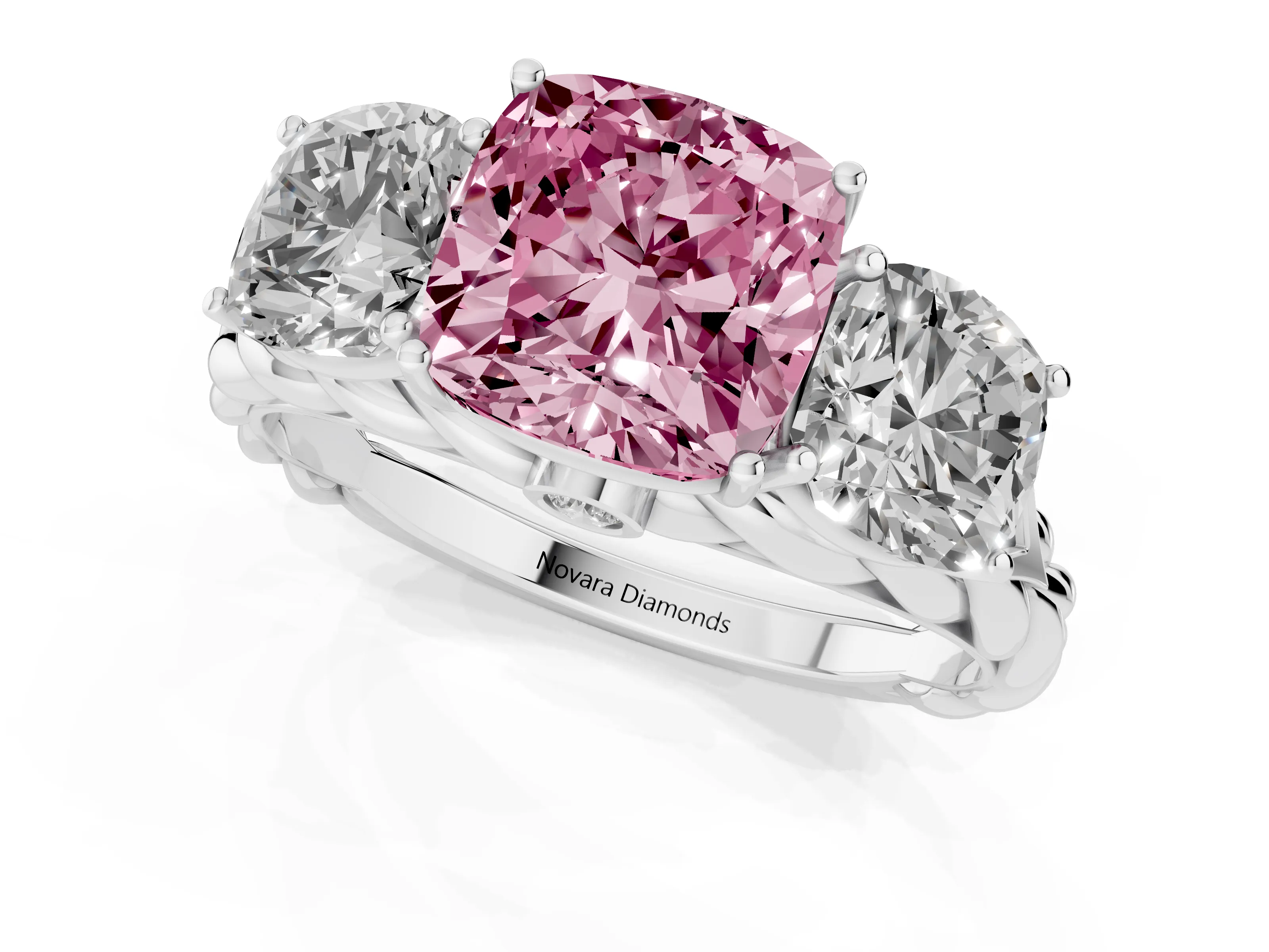 Fancy Pink Cushion Cut Diamond Three-Stone Ring Set in Platinum with Braided Band